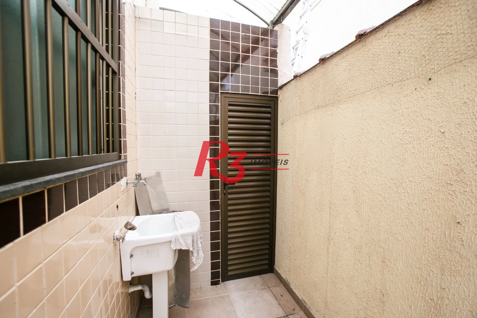Sobrado com 3 dormitórios à venda, 92 m² por R$ 800.000,00 - Ponta da Praia - Santos/SP