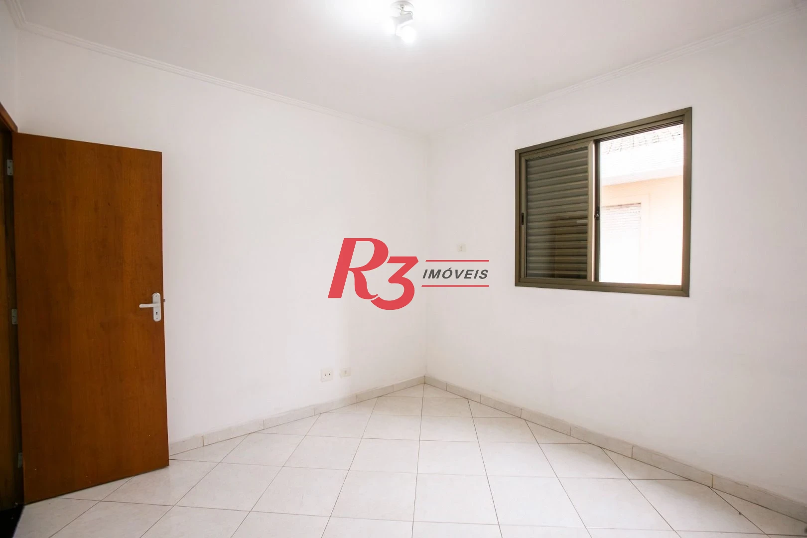 Sobrado com 3 dormitórios à venda, 92 m² por R$ 800.000,00 - Ponta da Praia - Santos/SP