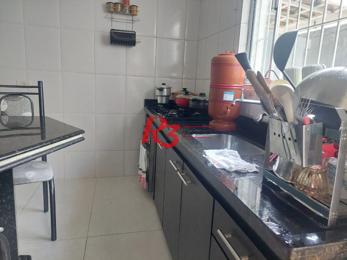 Casa com 4 dormitórios à venda, 375 m² por R$ 670.000,00 - Balneário Praia do Pernambuco - Guarujá/SP
