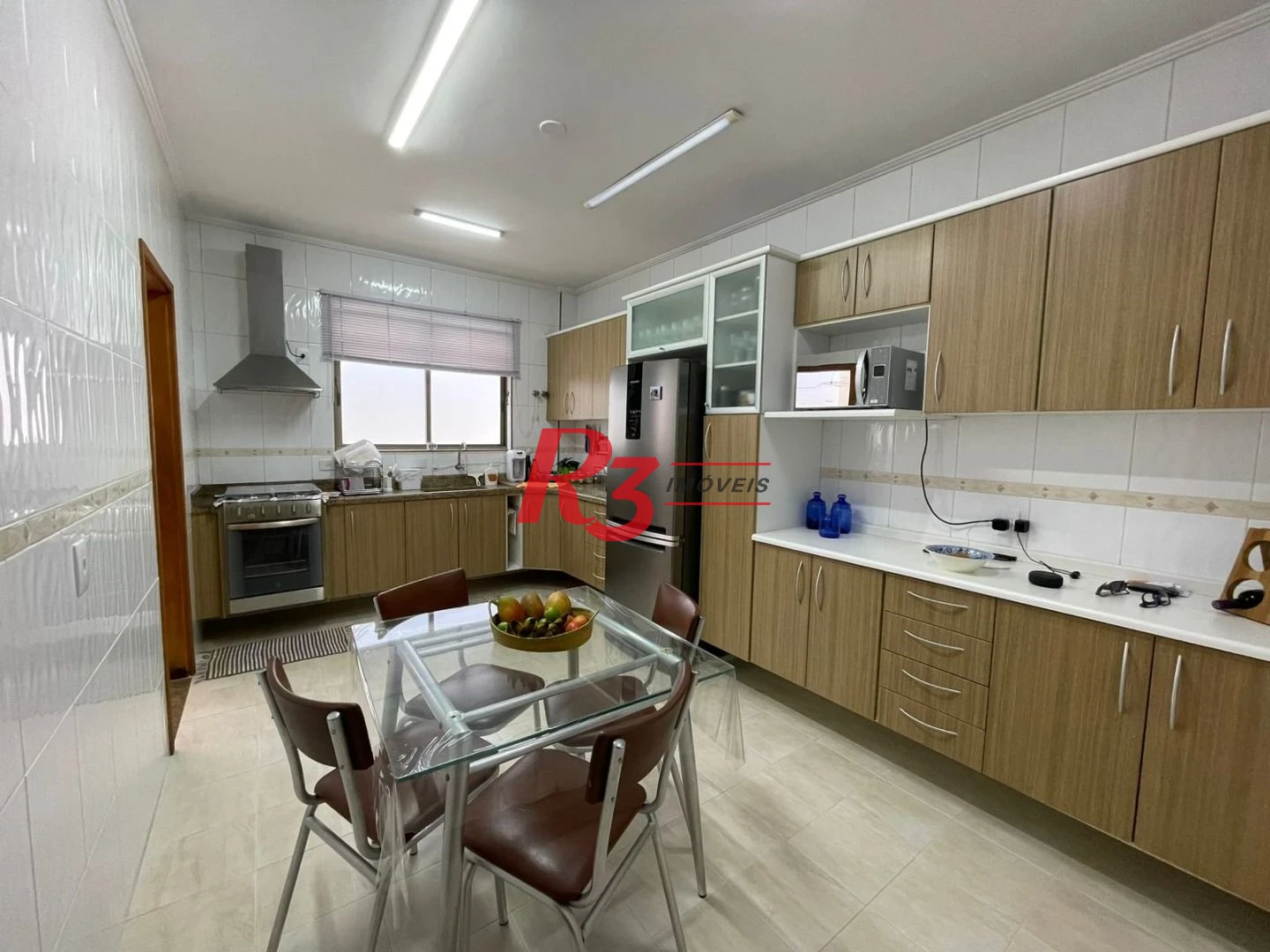 Casa com 3 dormitórios à venda, 143 m² por R$ 926.000,00 - Embaré - Santos/SP