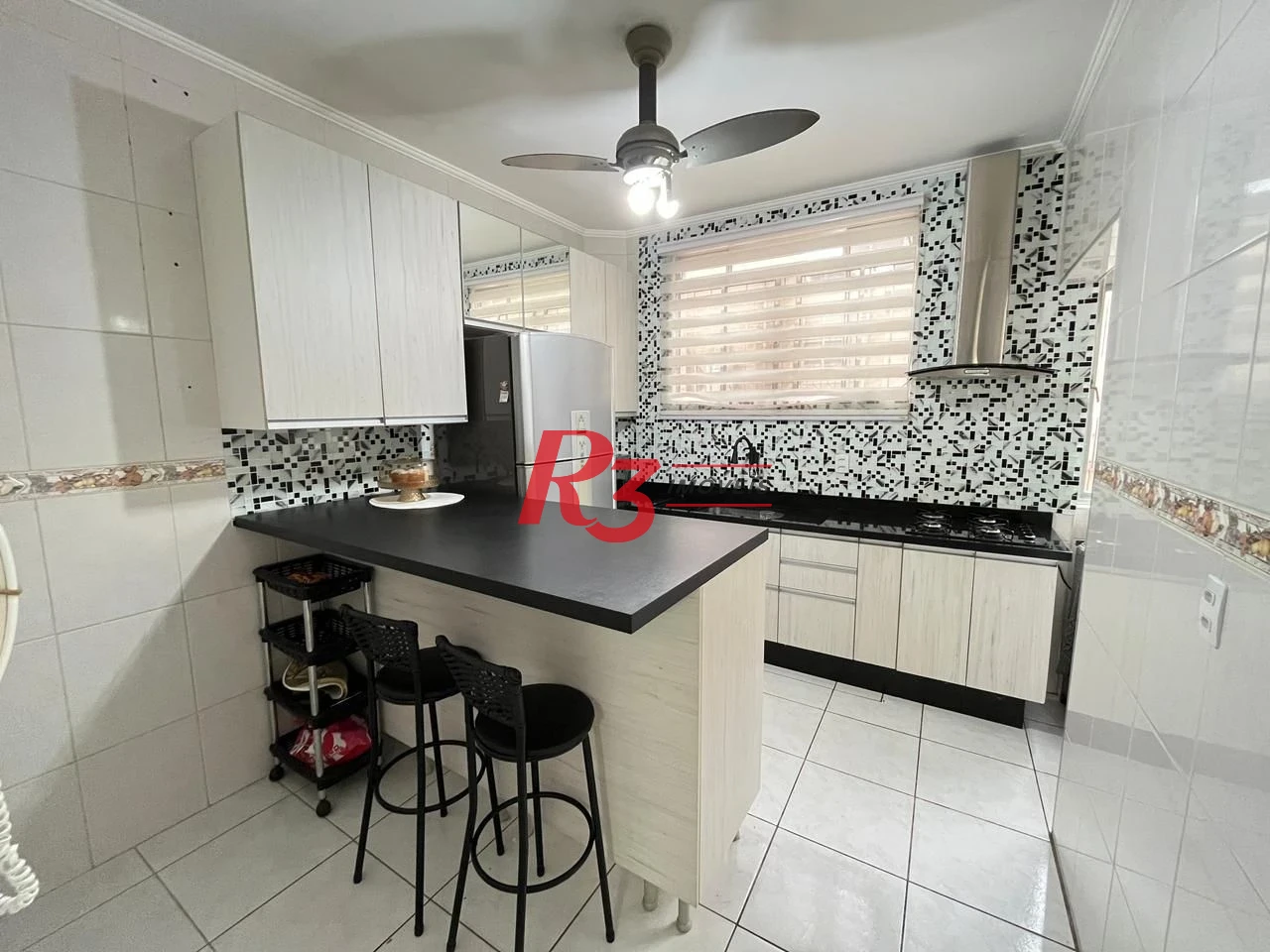 Apartamento com 3 dormitórios à venda, 104 m² por R$ 590.000,00 - Gonzaga - Santos/SP