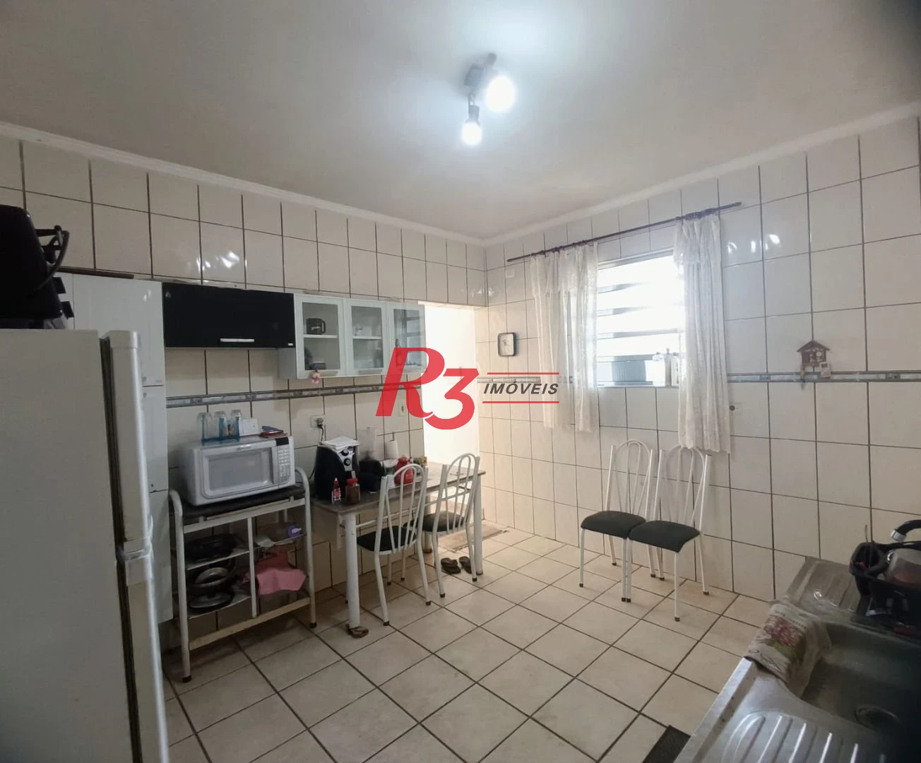 Sobrado com 3 dormitórios à venda, 135 m² por R$ 300.000,00 - Bom Retiro - Santos/SP