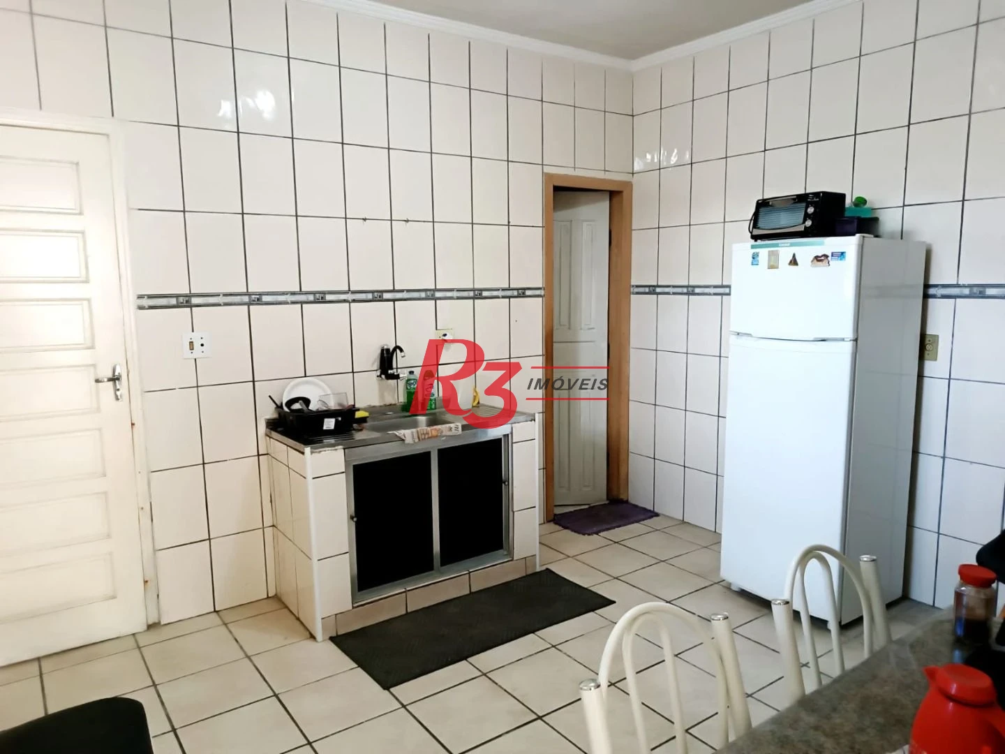 Sobrado com 3 dormitórios à venda, 135 m² por R$ 300.000,00 - Bom Retiro - Santos/SP