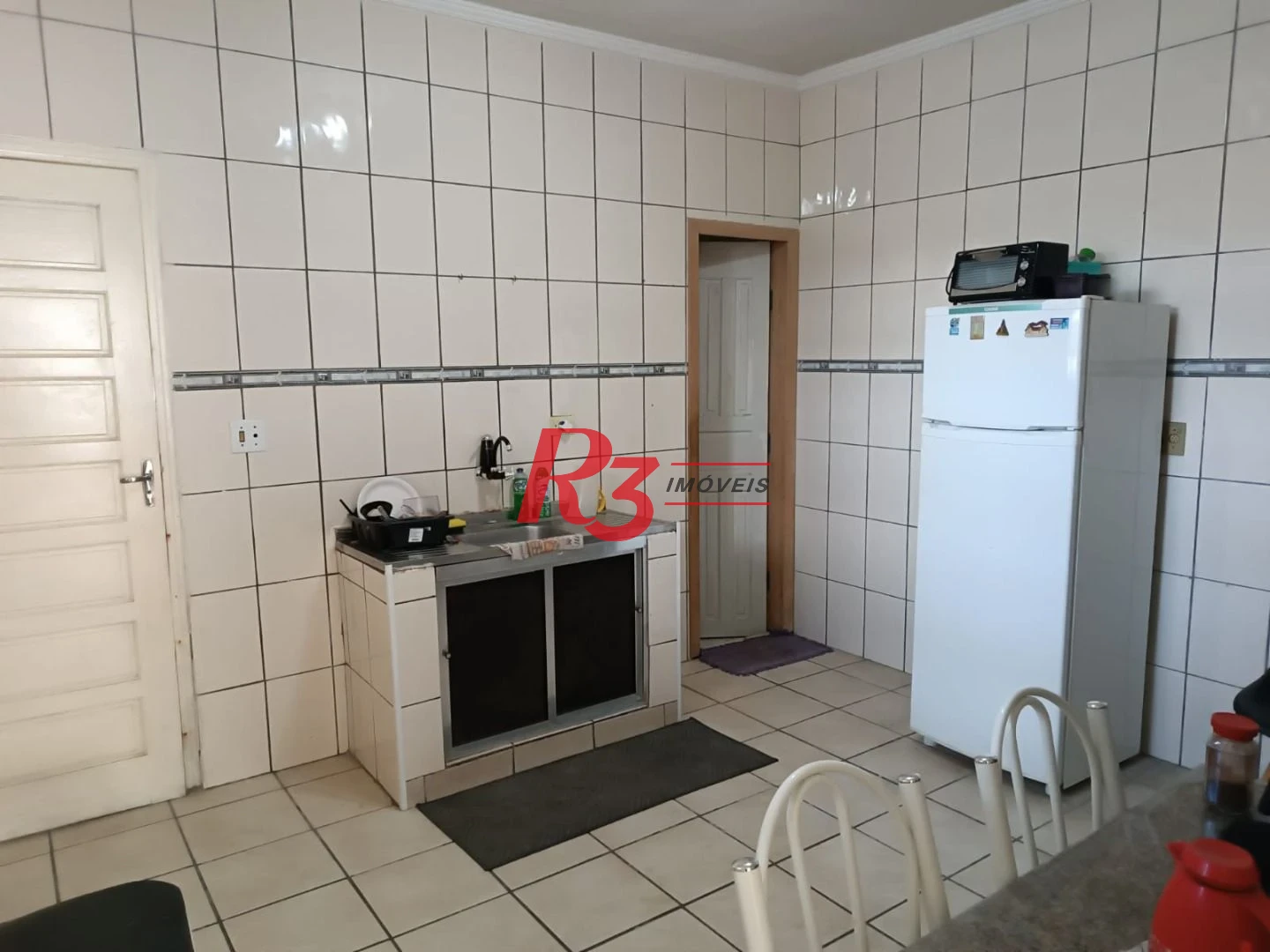 Sobrado com 3 dormitórios à venda, 135 m² por R$ 300.000,00 - Bom Retiro - Santos/SP