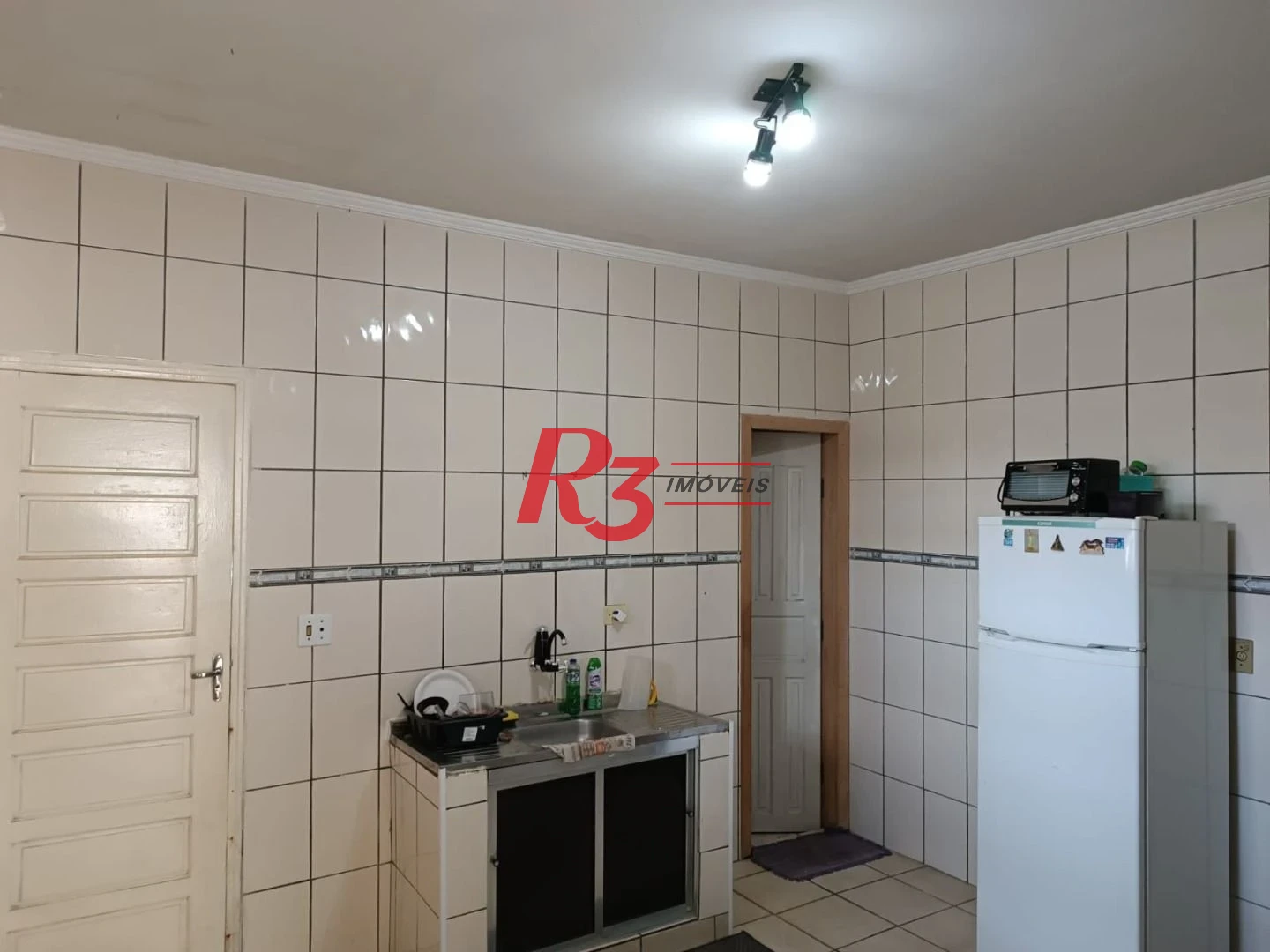 Sobrado com 3 dormitórios à venda, 135 m² por R$ 300.000,00 - Bom Retiro - Santos/SP