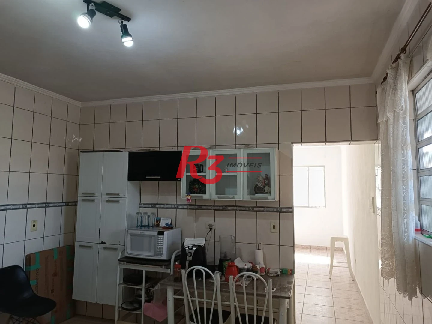 Sobrado com 3 dormitórios à venda, 135 m² por R$ 300.000,00 - Bom Retiro - Santos/SP