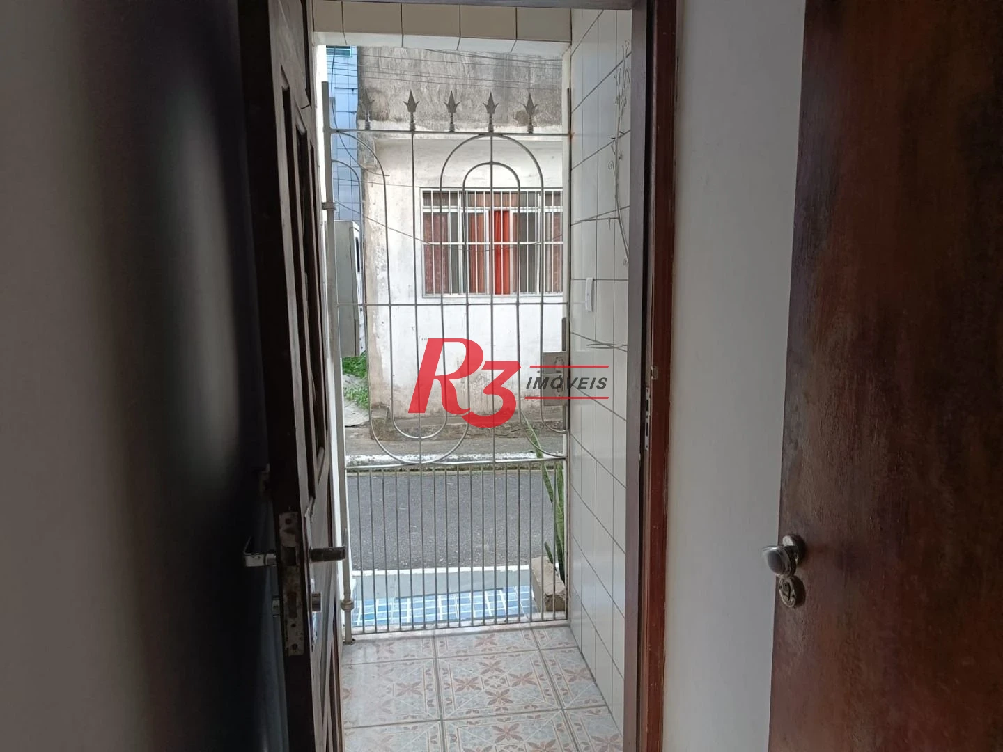 Sobrado com 3 dormitórios à venda, 135 m² por R$ 300.000,00 - Bom Retiro - Santos/SP