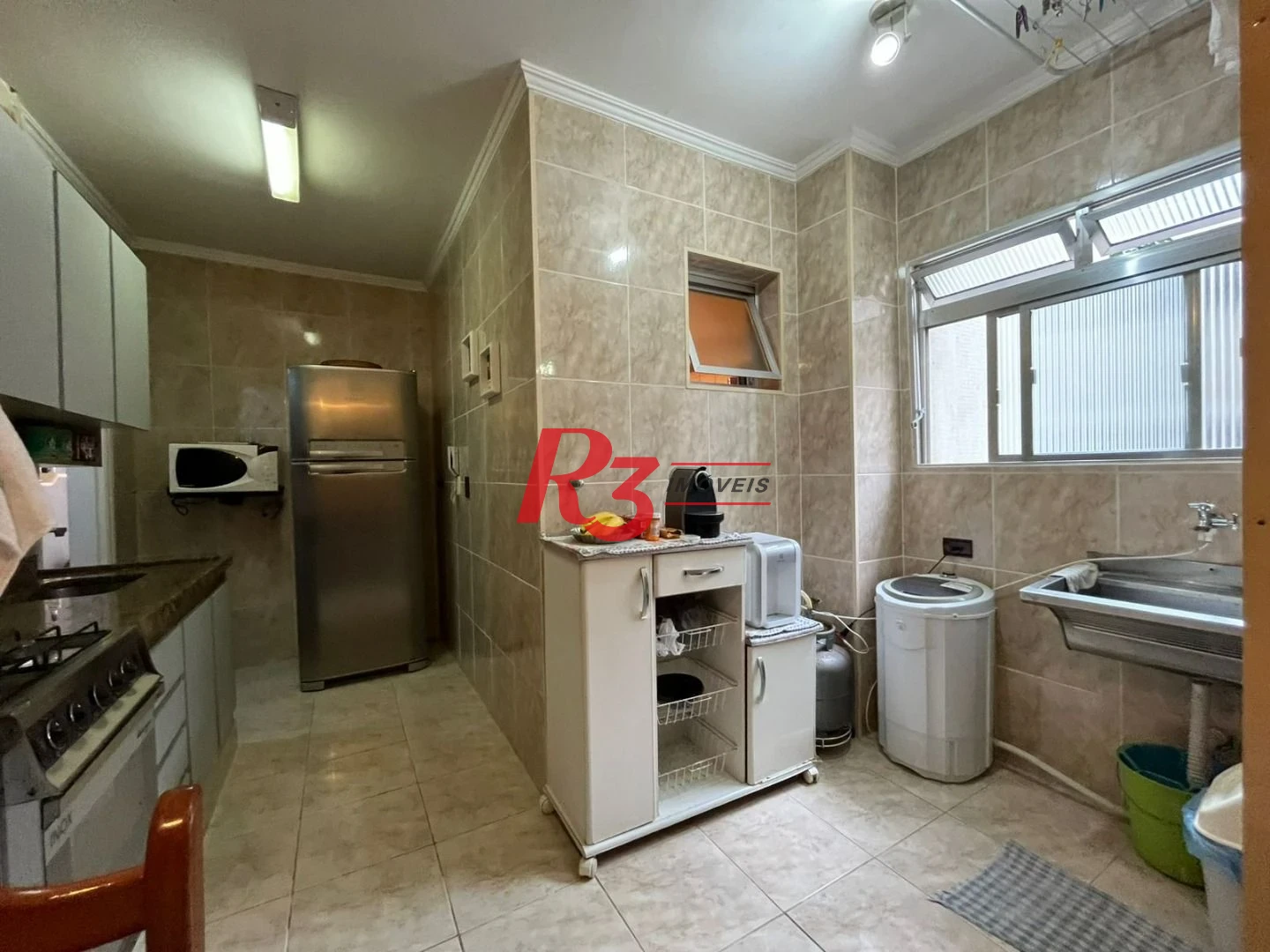 Apartamento com 3 dormitórios à venda, 82 m² por R$ 500.000,00 - Jardim Tejereba - Guarujá/SP