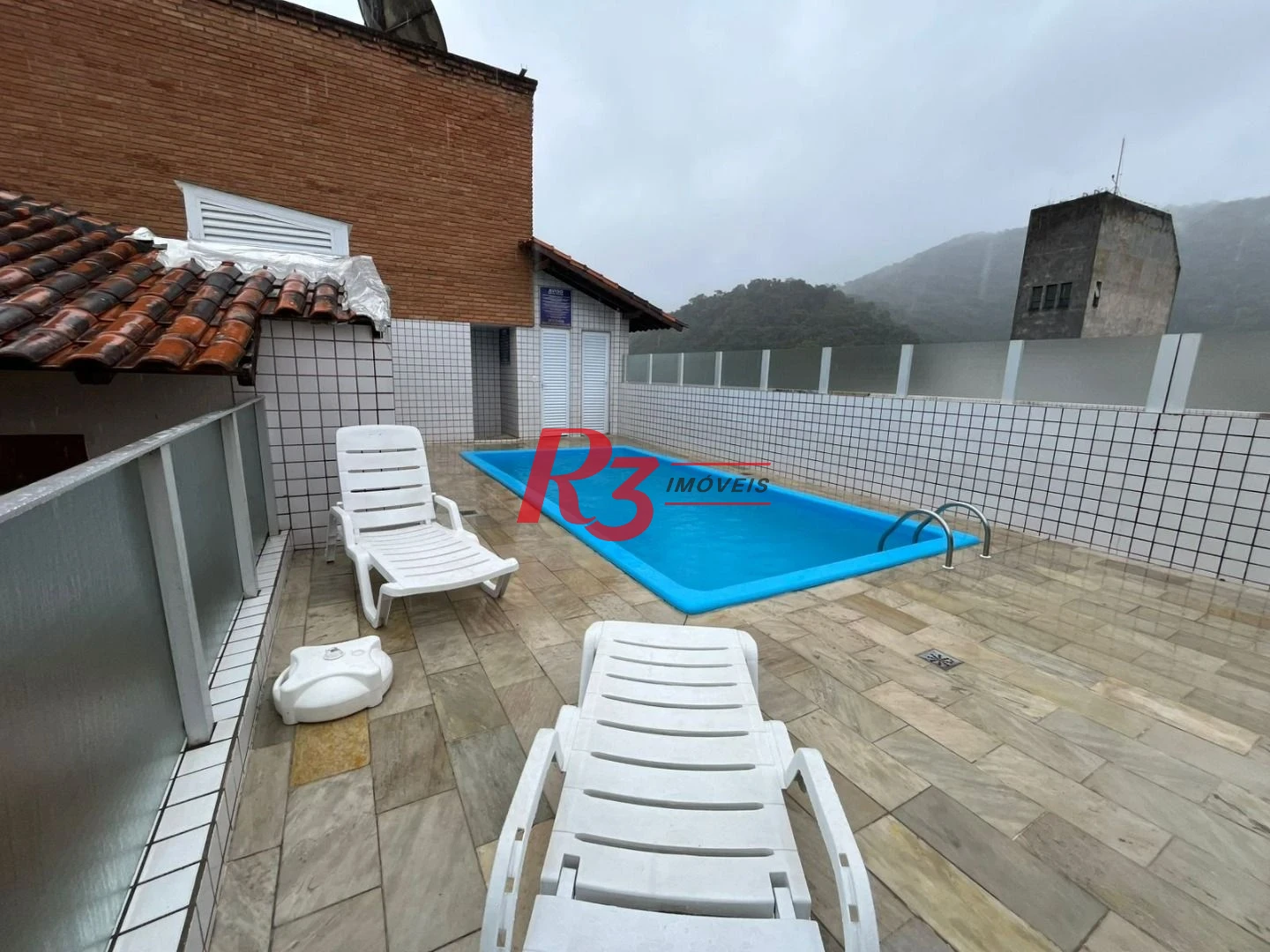 Apartamento com 3 dormitórios à venda, 82 m² por R$ 500.000,00 - Jardim Tejereba - Guarujá/SP