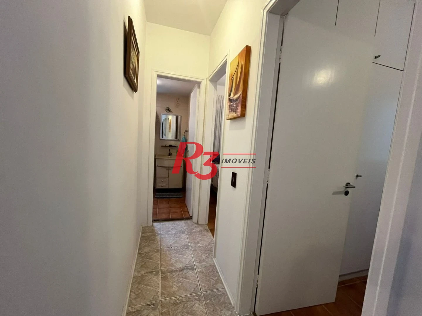 Apartamento com 3 dormitórios à venda, 82 m² por R$ 500.000,00 - Jardim Tejereba - Guarujá/SP