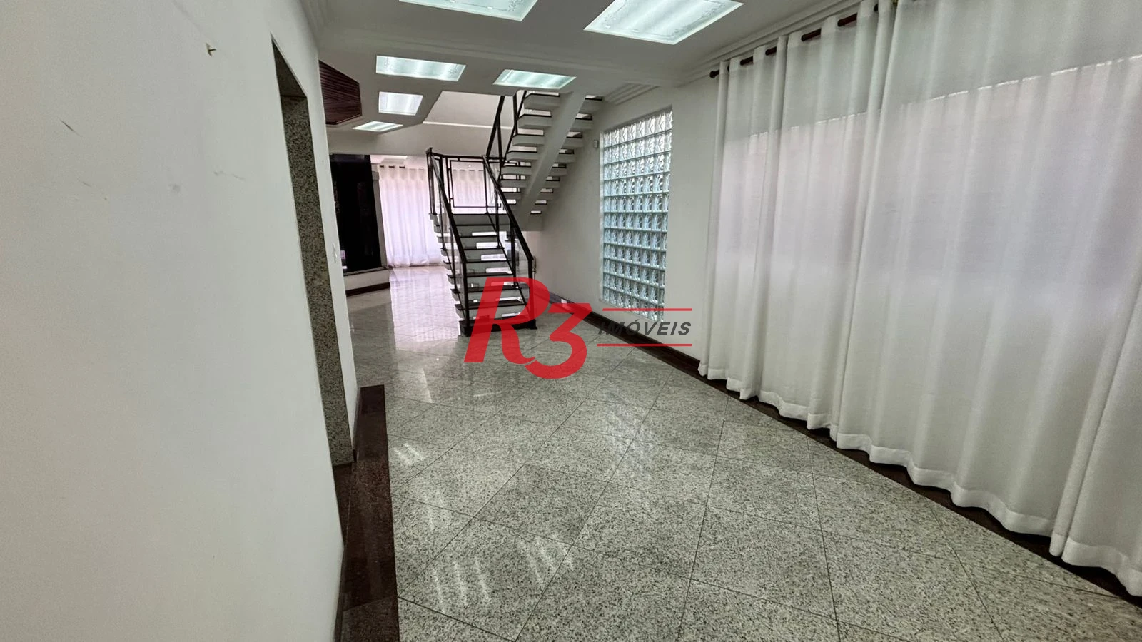 Sobrado à venda, 329 m² por R$ 2.650.000,00 - Ponta da Praia - Santos/SP