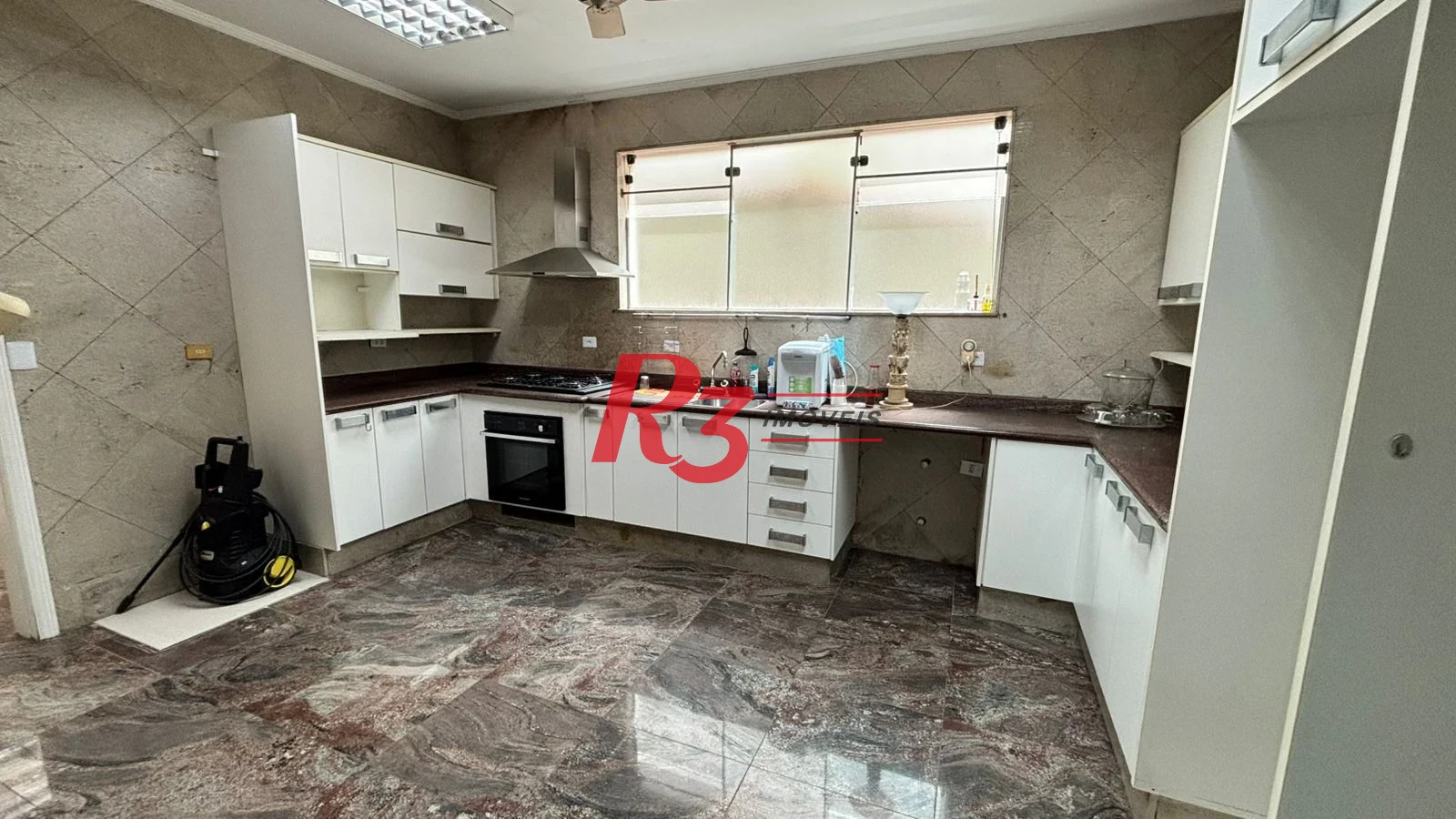 Sobrado à venda, 329 m² por R$ 2.650.000,00 - Ponta da Praia - Santos/SP