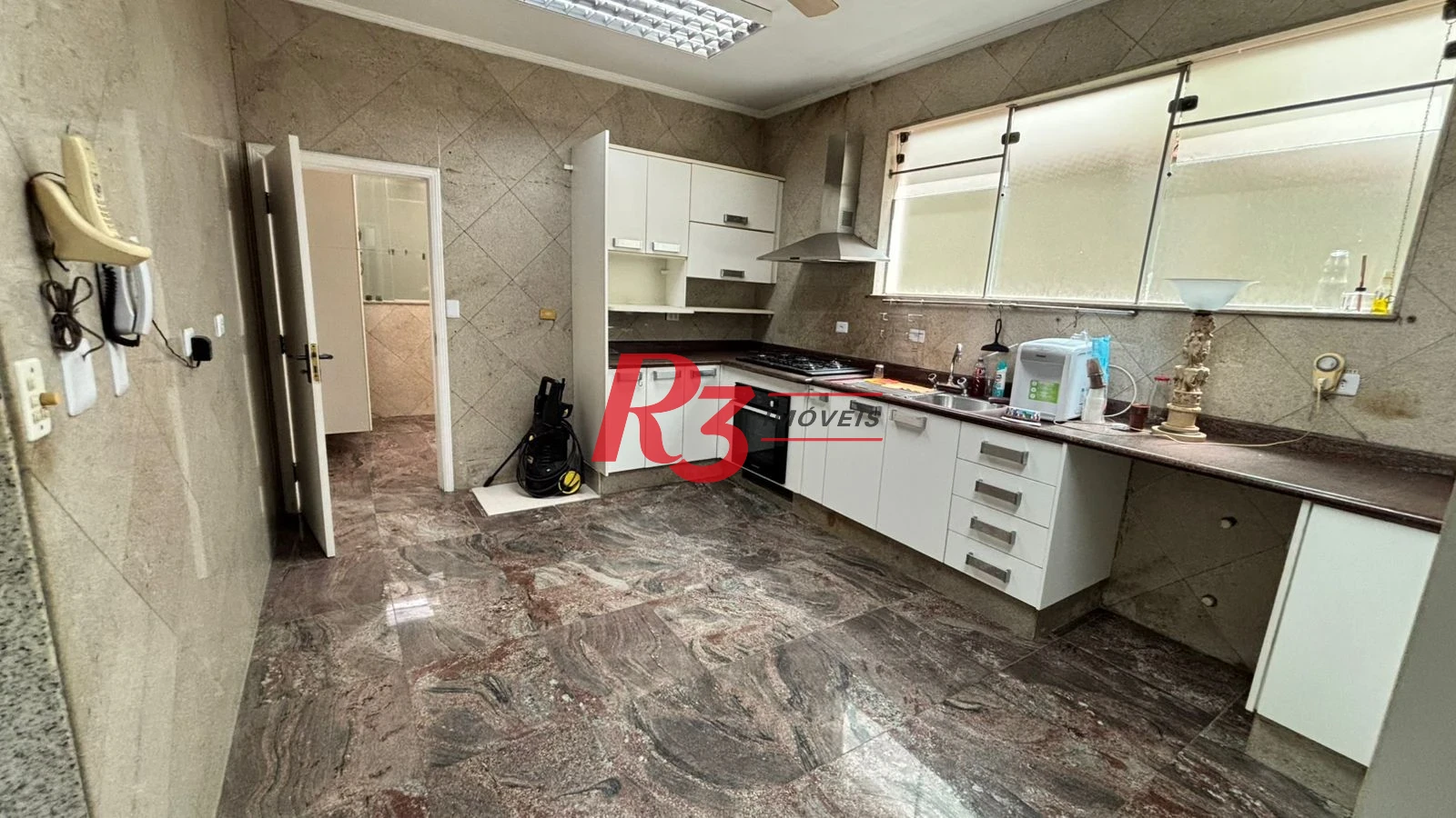 Sobrado à venda, 329 m² por R$ 2.650.000,00 - Ponta da Praia - Santos/SP