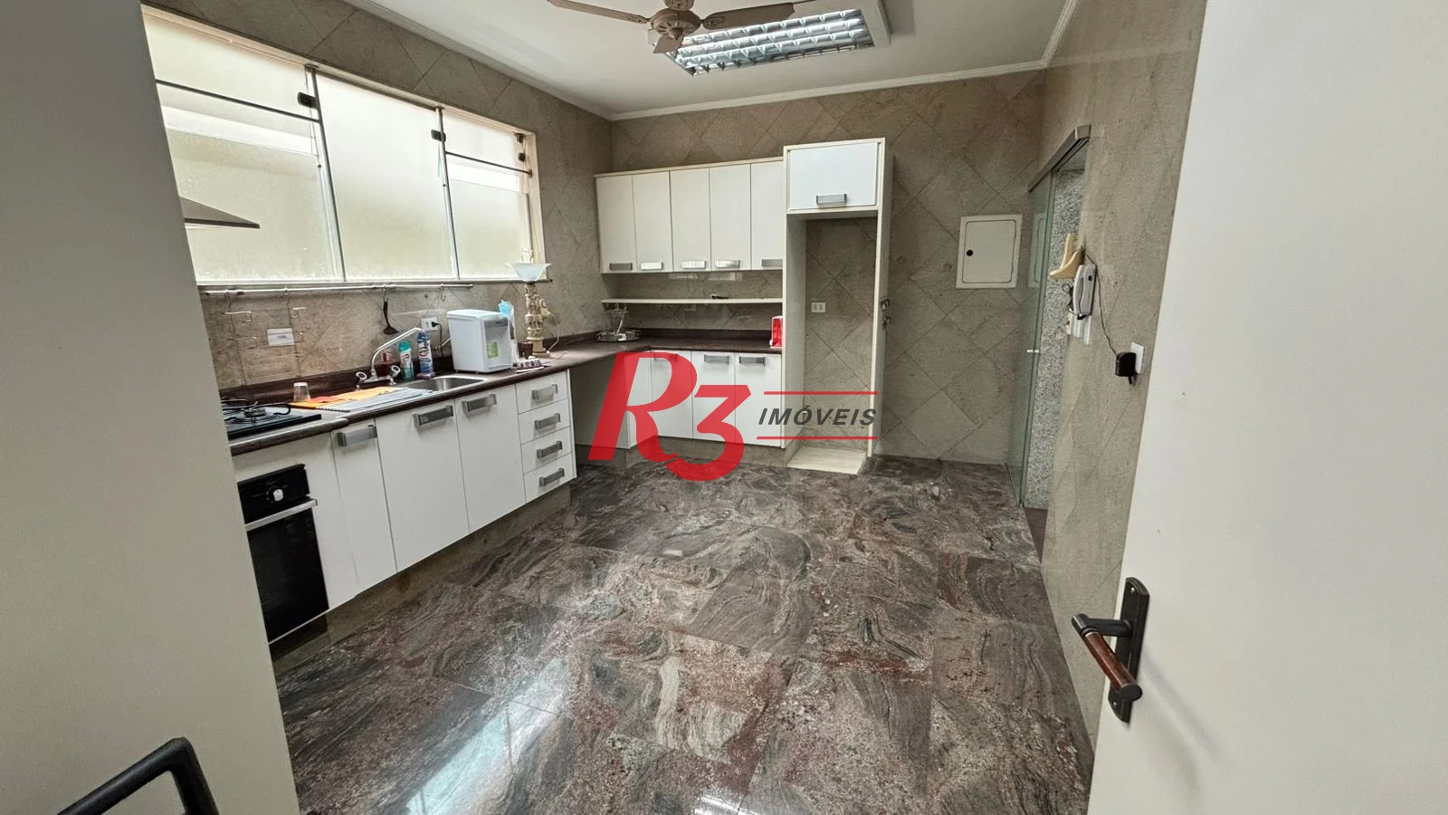 Sobrado à venda, 329 m² por R$ 2.650.000,00 - Ponta da Praia - Santos/SP