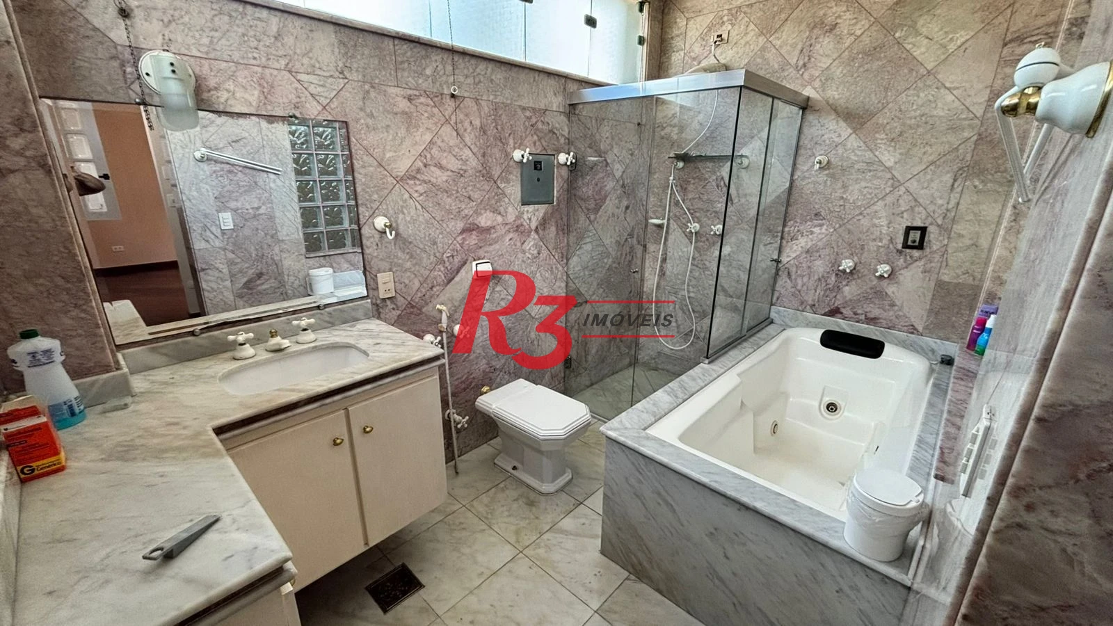 Sobrado à venda, 329 m² por R$ 2.650.000,00 - Ponta da Praia - Santos/SP
