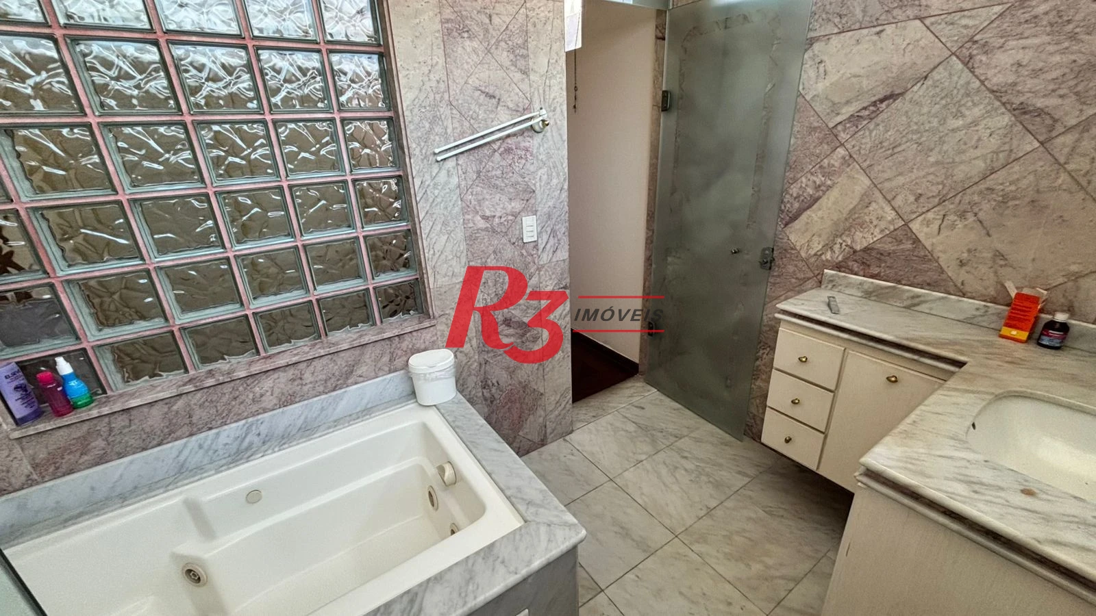 Sobrado à venda, 329 m² por R$ 2.650.000,00 - Ponta da Praia - Santos/SP