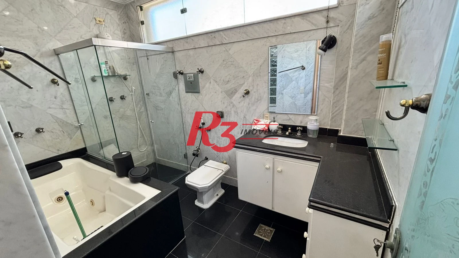 Sobrado à venda, 329 m² por R$ 2.650.000,00 - Ponta da Praia - Santos/SP
