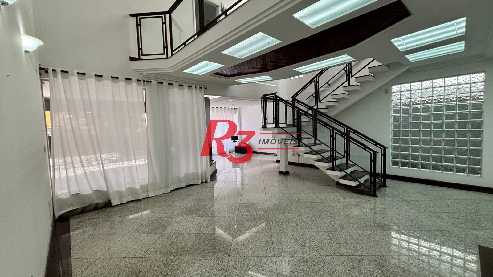 Sobrado à venda, 329 m² por R$ 2.650.000,00 - Ponta da Praia - Santos/SP