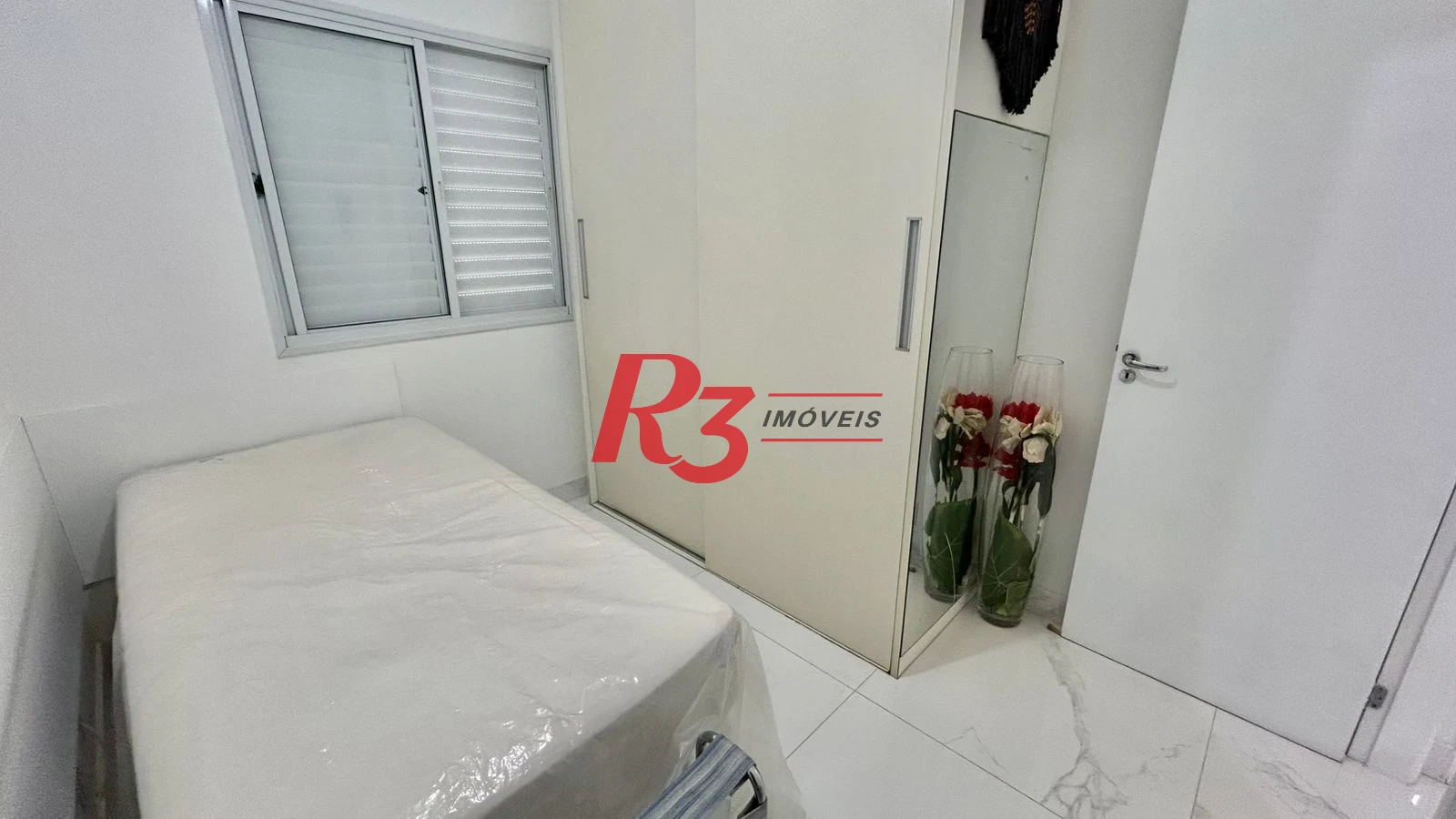 Apartamento com 2 dormitórios à venda, por R$ 650.000 - Centro - São Vicente/SP