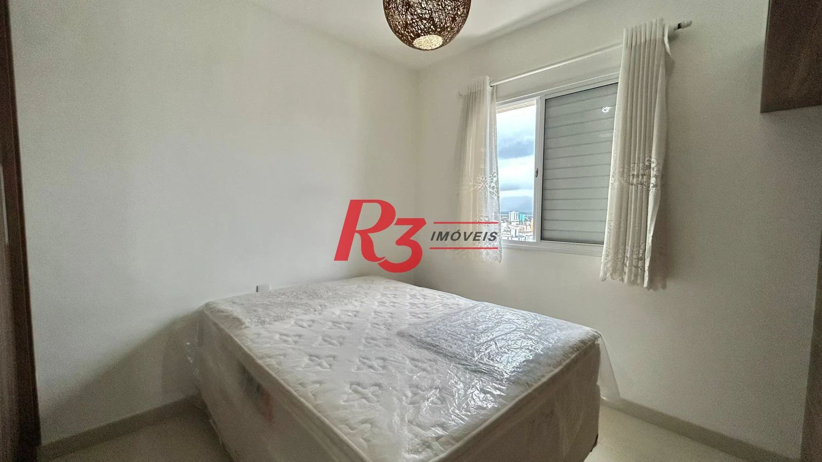 Apartamento com 2 dormitórios à venda, por R$ 650.000 - Centro - São Vicente/SP