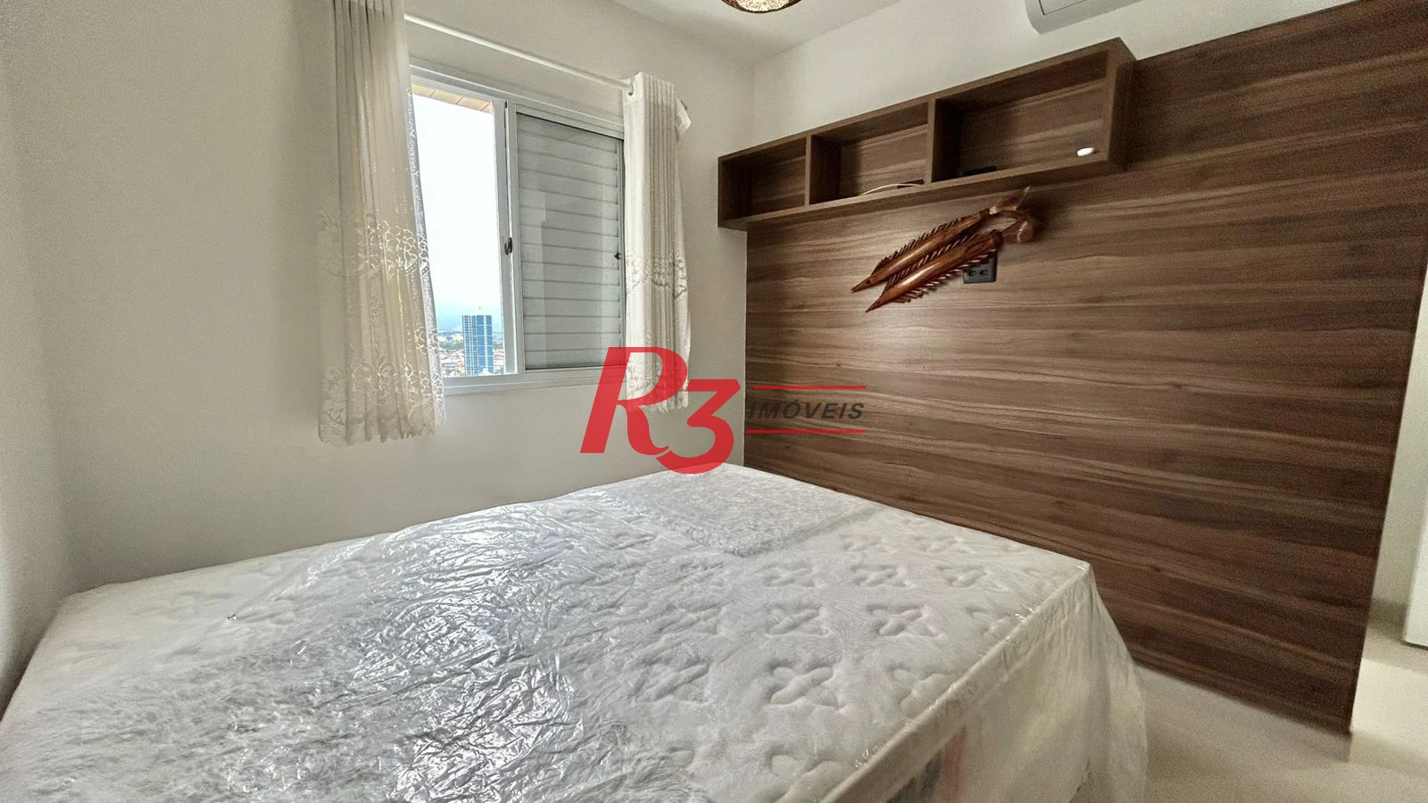 Apartamento com 2 dormitórios à venda, por R$ 650.000 - Centro - São Vicente/SP
