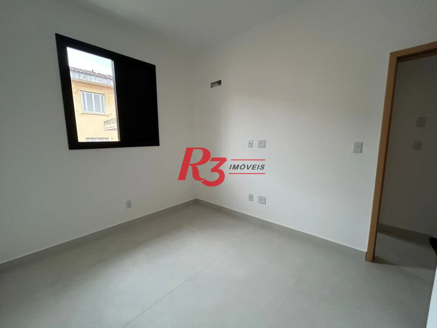 Casa com 2 dormitórios à venda, 90 m² por R$ 720.000,00 - Marapé - Santos/SP