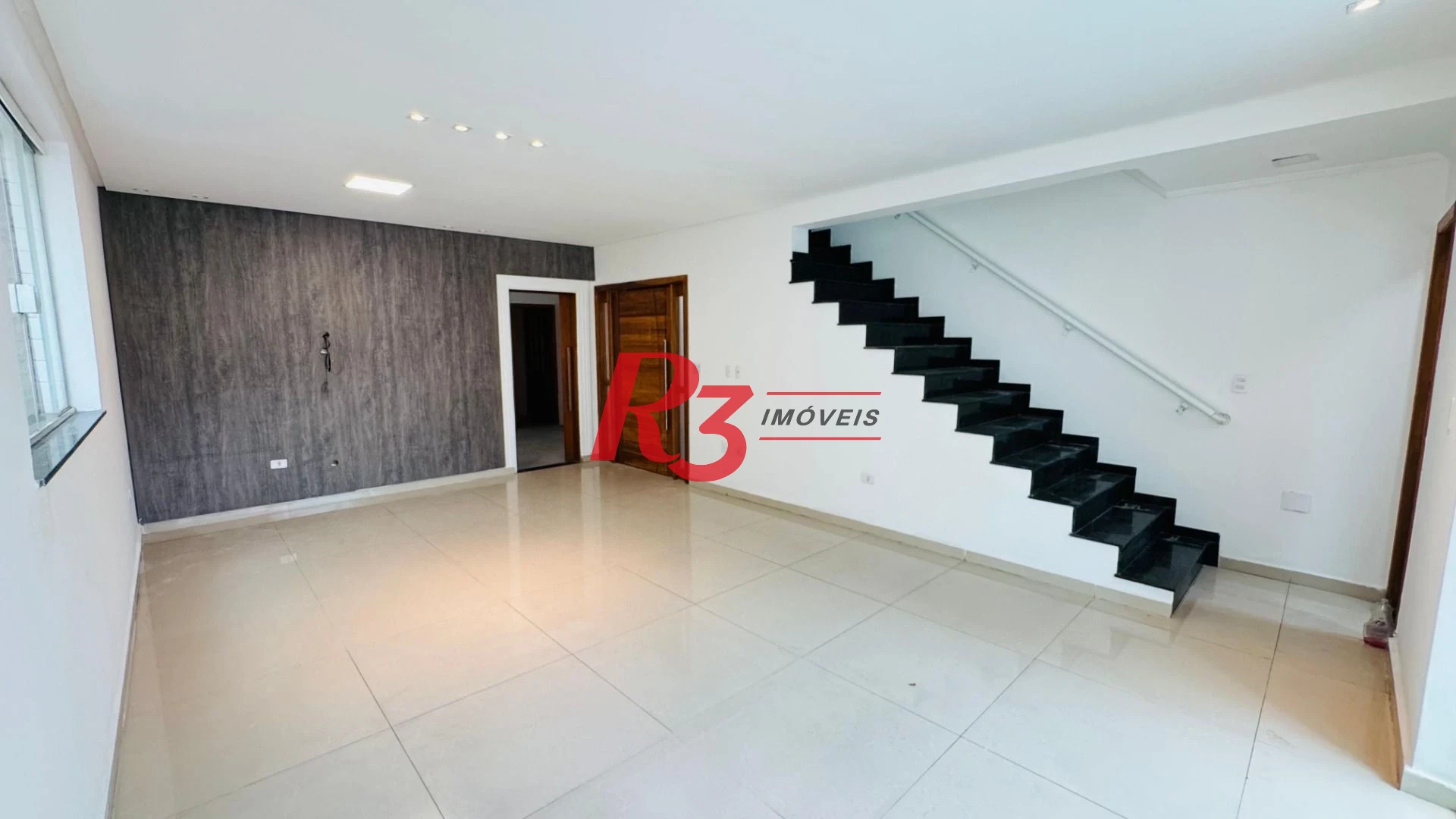 Casa com 4 dormitórios à venda, 194 m² por R$ 1.800.000,00 - Gonzaga - Santos/SP