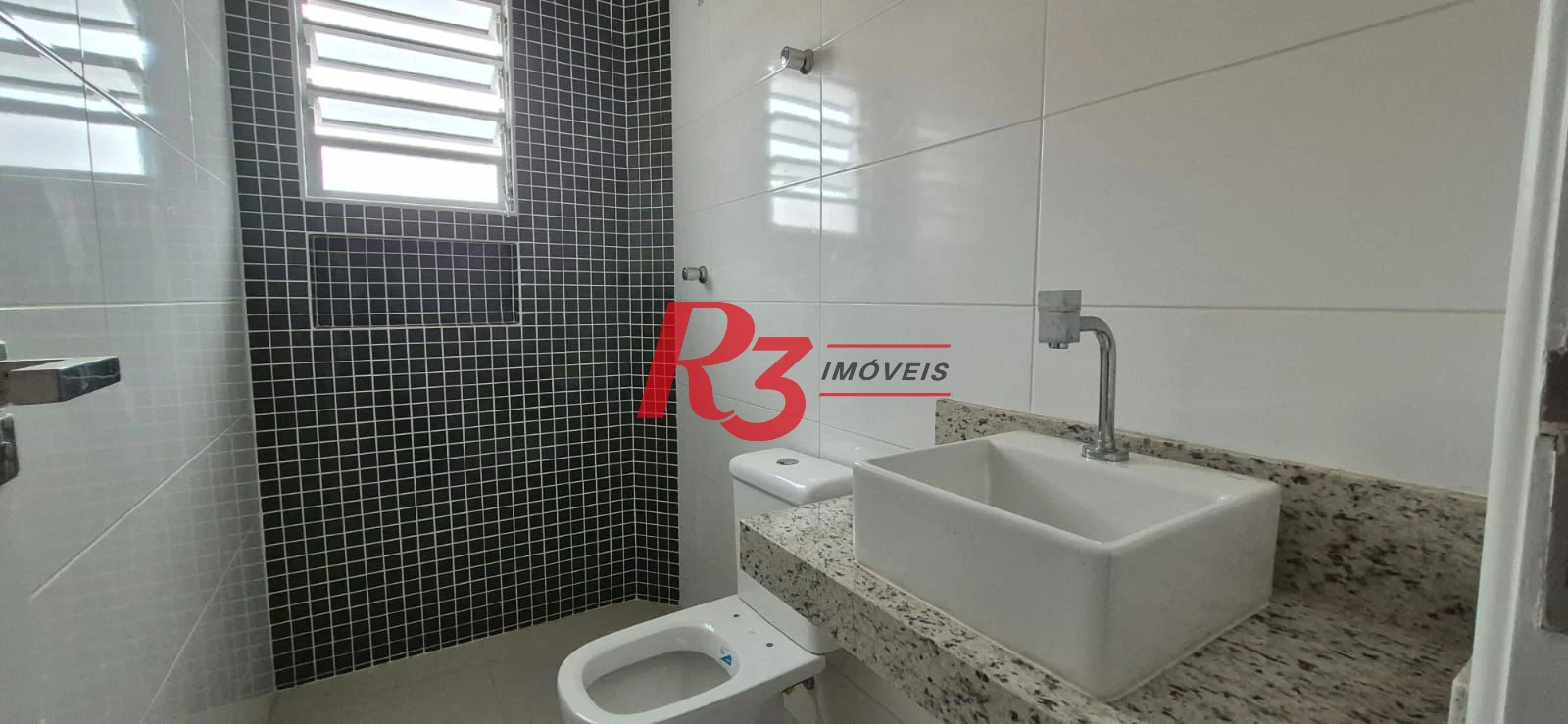 Casa com 3 dormitórios à venda, 155 m² por R$ 1.300.000,00 - Embaré - Santos/SP