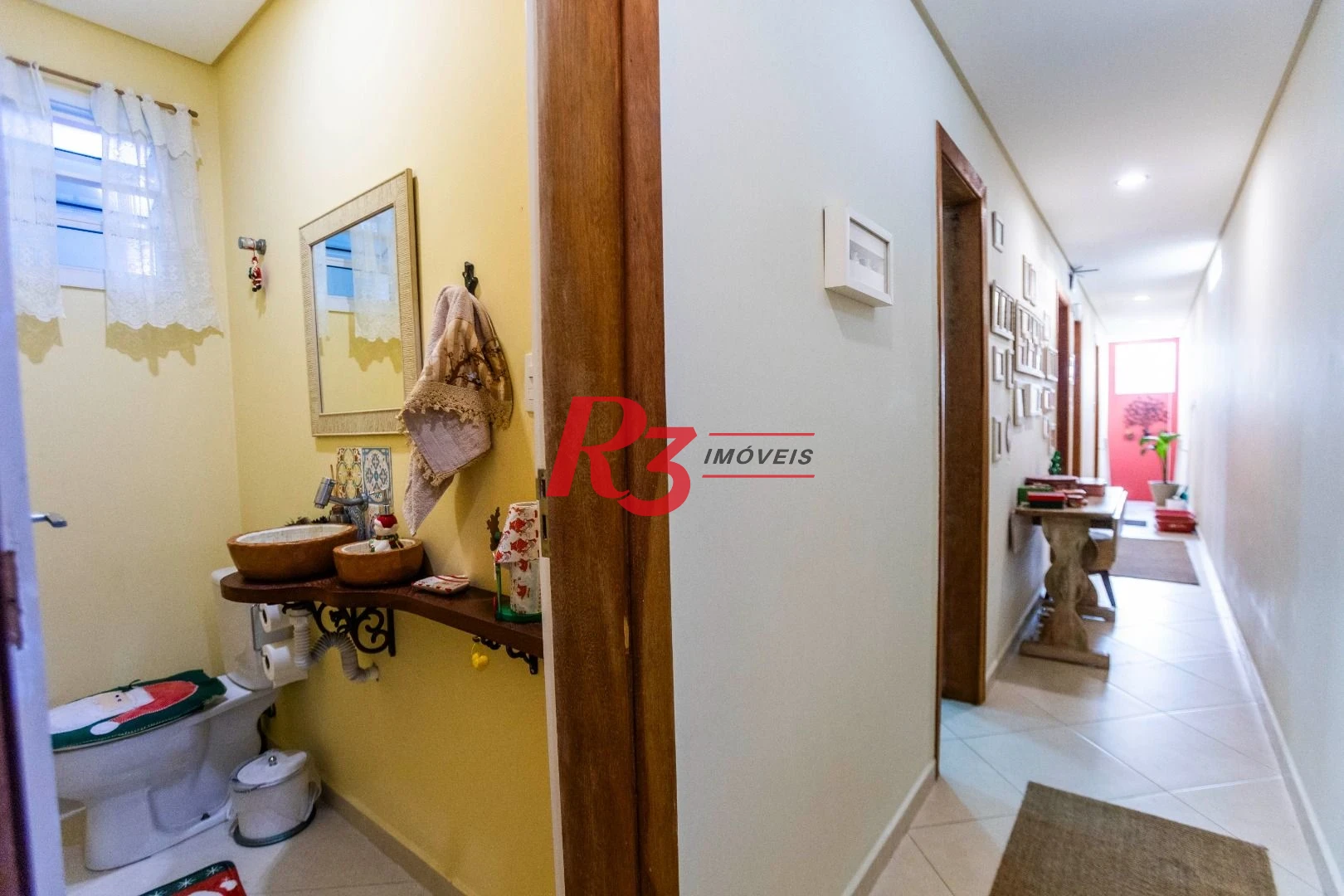 Casa à venda, 162 m² por R$ 990.000,00 - Estuário - Santos/SP