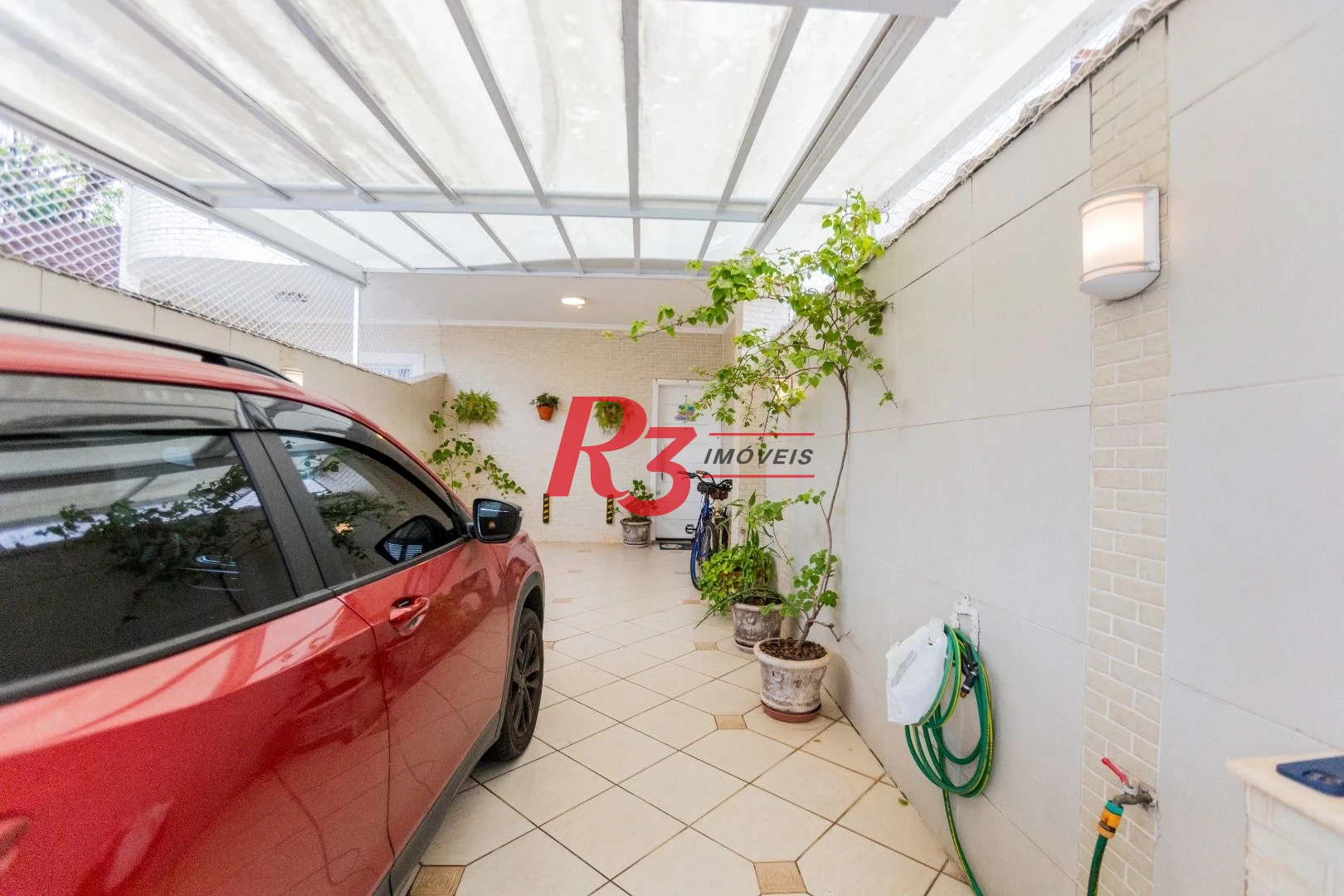 Casa à venda, 162 m² por R$ 990.000,00 - Estuário - Santos/SP