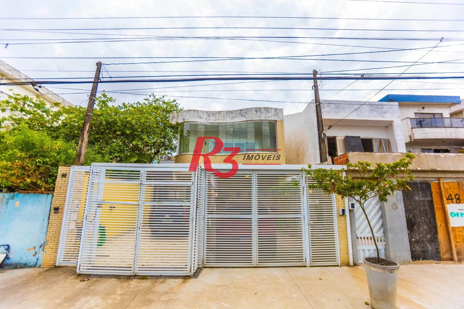 Casa à venda, 162 m² por R$ 990.000,00 - Estuário - Santos/SP