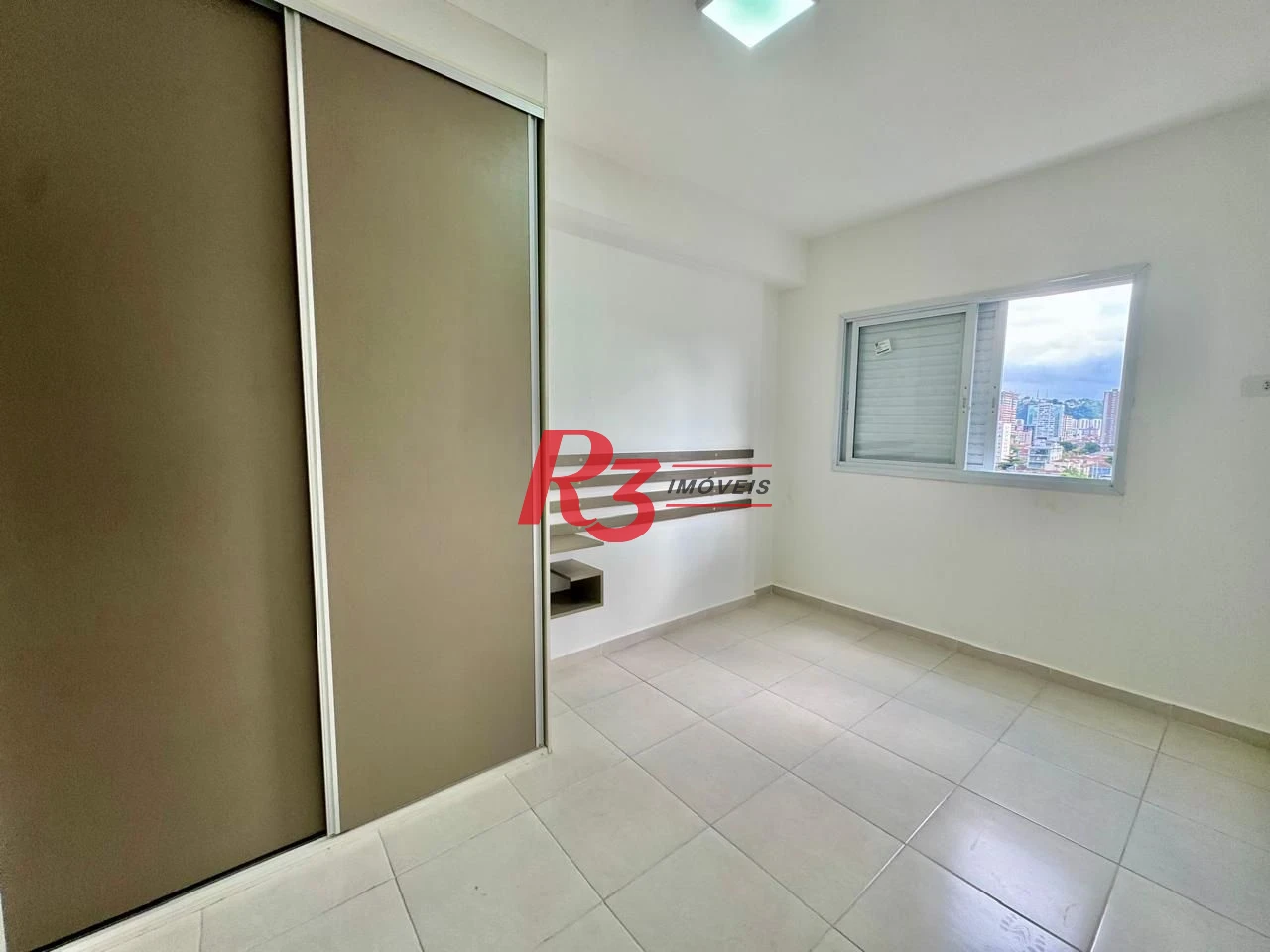 Apartamento com 2 dormitórios à venda, 59 m² por R$ 535.000,00 - Macuco - Santos/SP