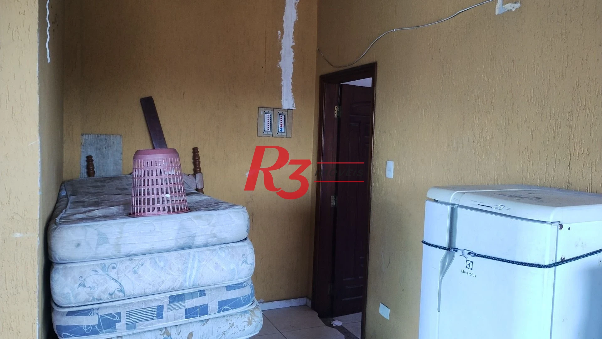 Sobrado com 3 dormitórios à venda, 283 m² por R$ 650.000,00 - Chico de Paula - Santos/SP