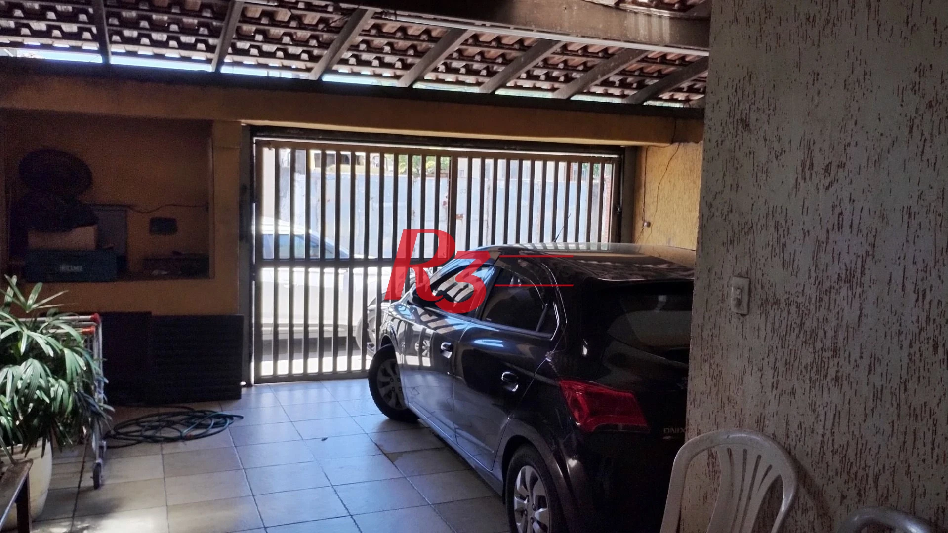 Sobrado com 3 dormitórios à venda, 283 m² por R$ 650.000,00 - Chico de Paula - Santos/SP