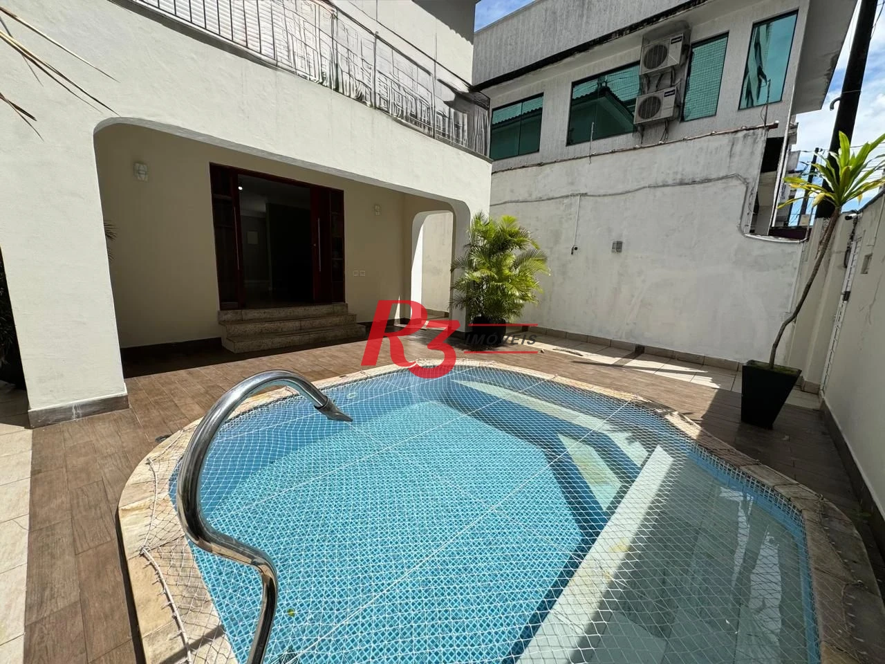 Casa com 3 dormitórios à venda, 231 m² por R$ 1.500.000,00 - Gonzaguinha - São Vicente/SP