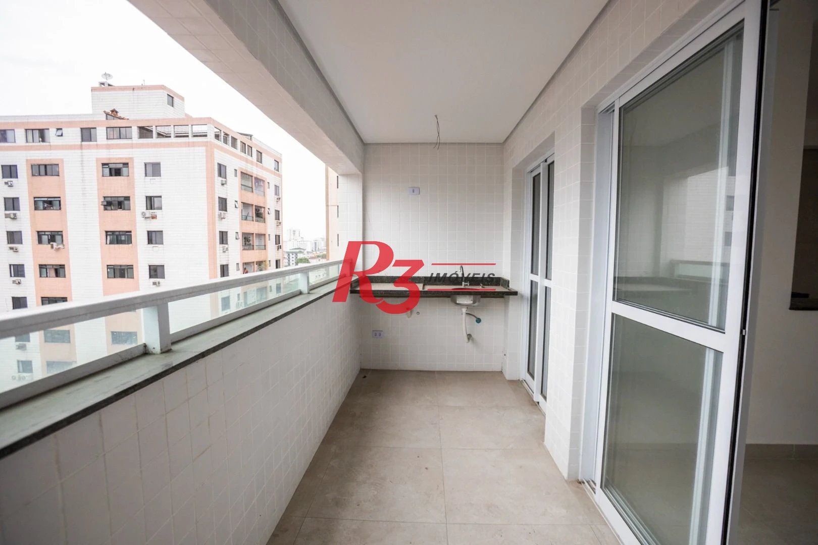 Apartamento com 2 dormitórios à venda, 55 m² por R$ 570.000,00 - Marapé - Santos/SP