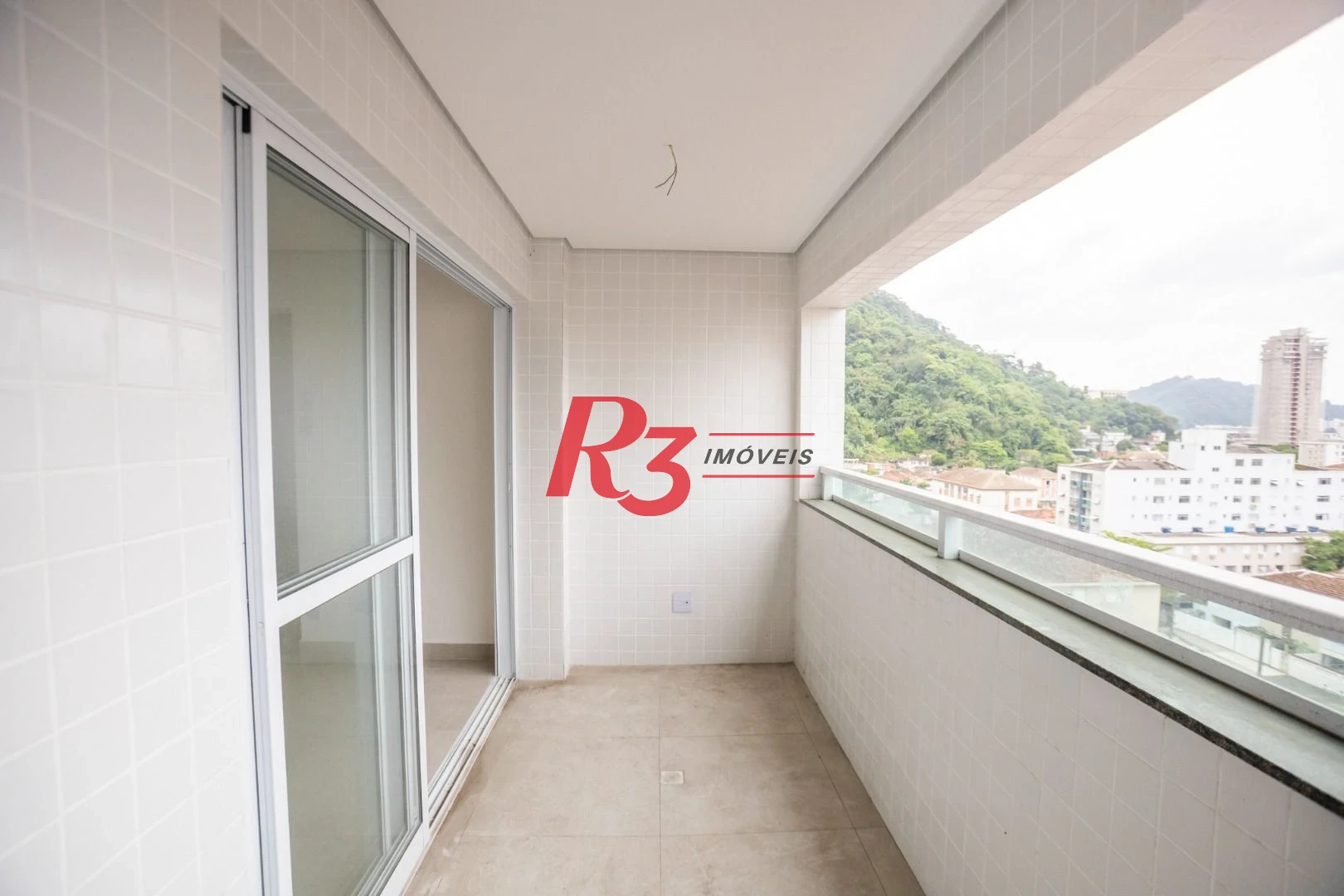 Apartamento com 2 dormitórios à venda, 55 m² por R$ 570.000,00 - Marapé - Santos/SP
