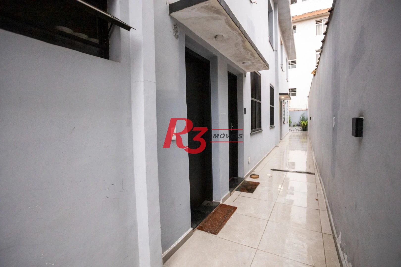 Casa com 2 dormitórios à venda, 89 m² por R$ 430.000,00 - Embaré - Santos/SP