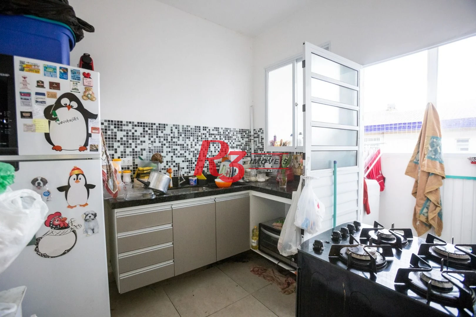 Casa com 2 dormitórios à venda, 89 m² por R$ 430.000,00 - Embaré - Santos/SP