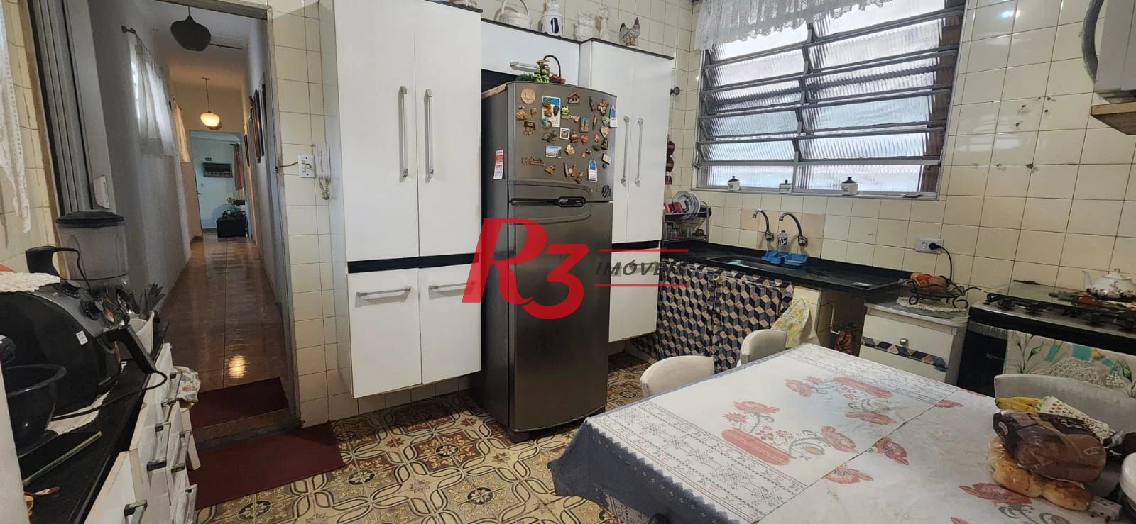 Casa com 3 dormitórios à venda, 117 m² por R$ 790.000,00 - Aparecida - Santos/SP