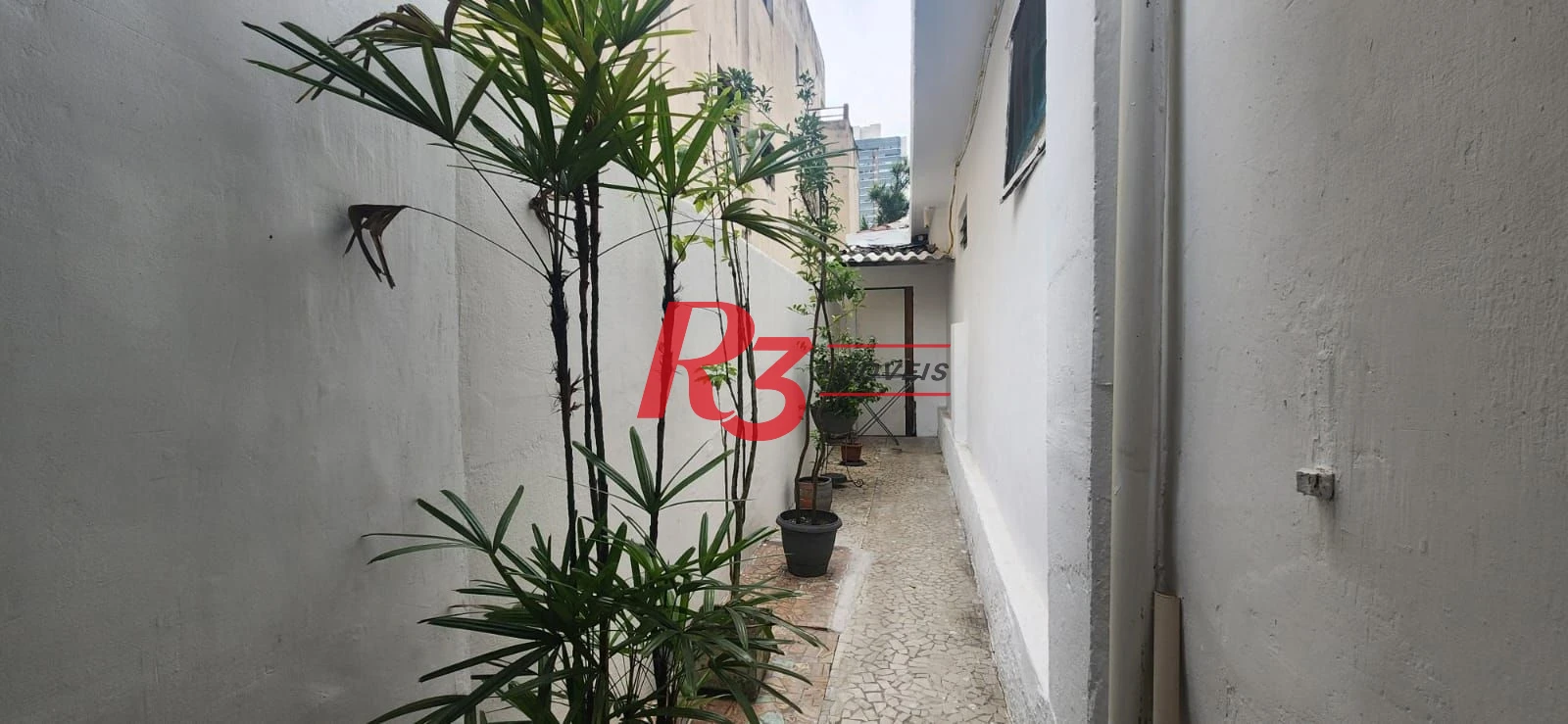 Casa com 3 dormitórios à venda, 117 m² por R$ 790.000,00 - Aparecida - Santos/SP