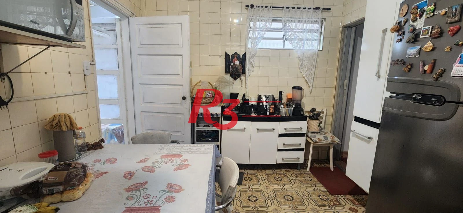 Casa com 3 dormitórios à venda, 117 m² por R$ 790.000,00 - Aparecida - Santos/SP