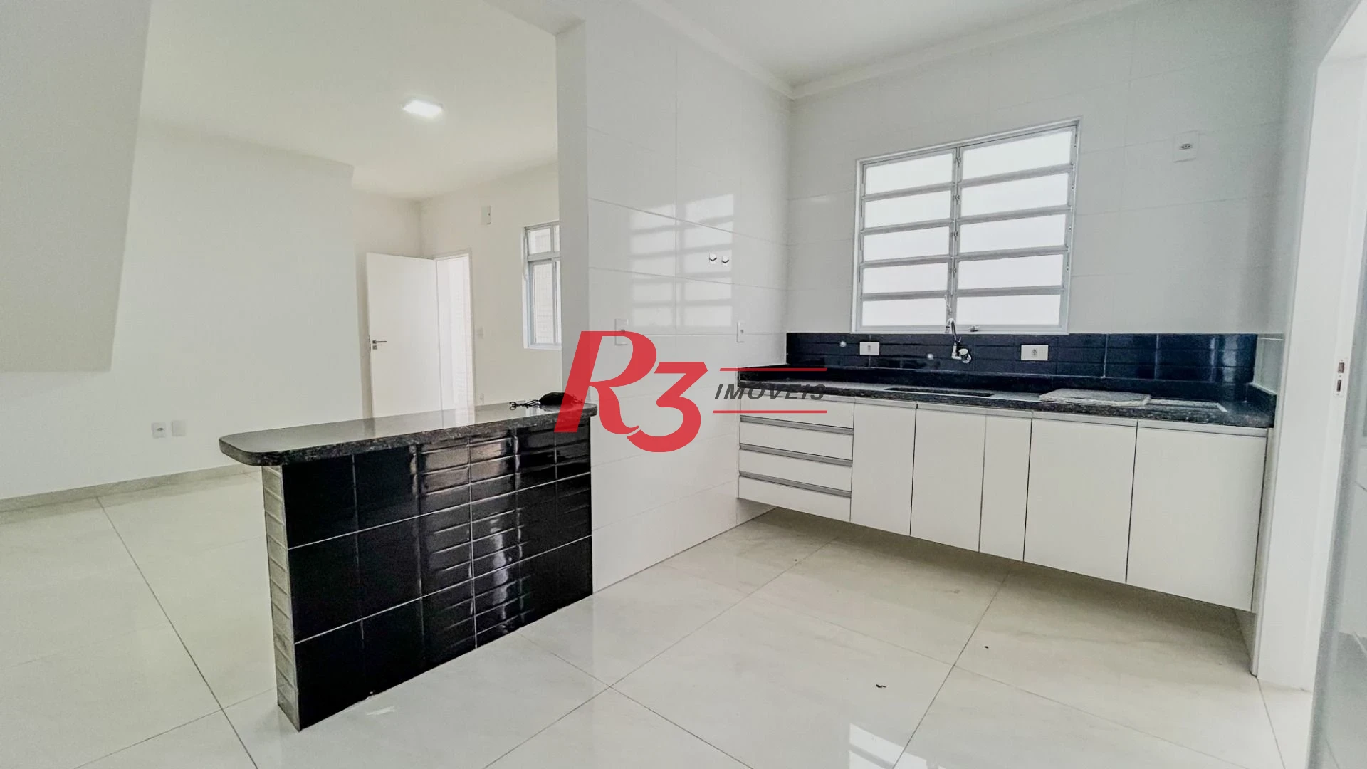 Casa com 3 dormitórios à venda, 95 m² por R$ 775.000,00 - Ponta da Praia - Santos/SP