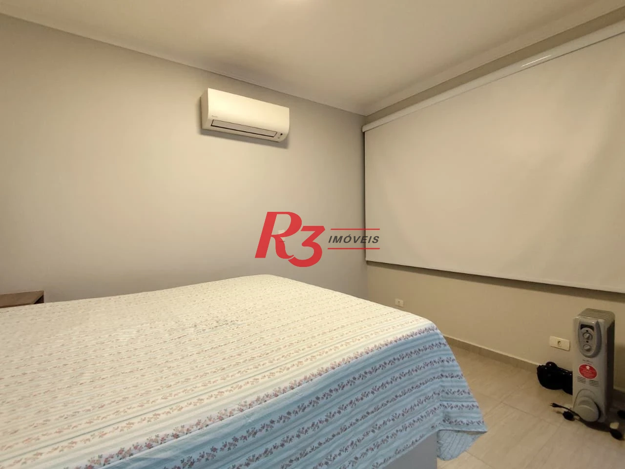 Casa com 3 dormitórios à venda, 165 m² por R$ 1.100.000,00 - Marapé - Santos/SP