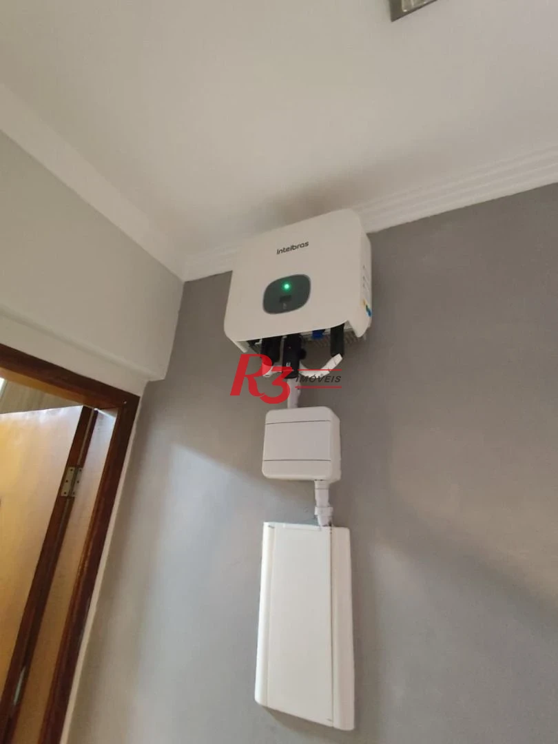 Casa com 3 dormitórios à venda, 165 m² por R$ 1.100.000,00 - Marapé - Santos/SP