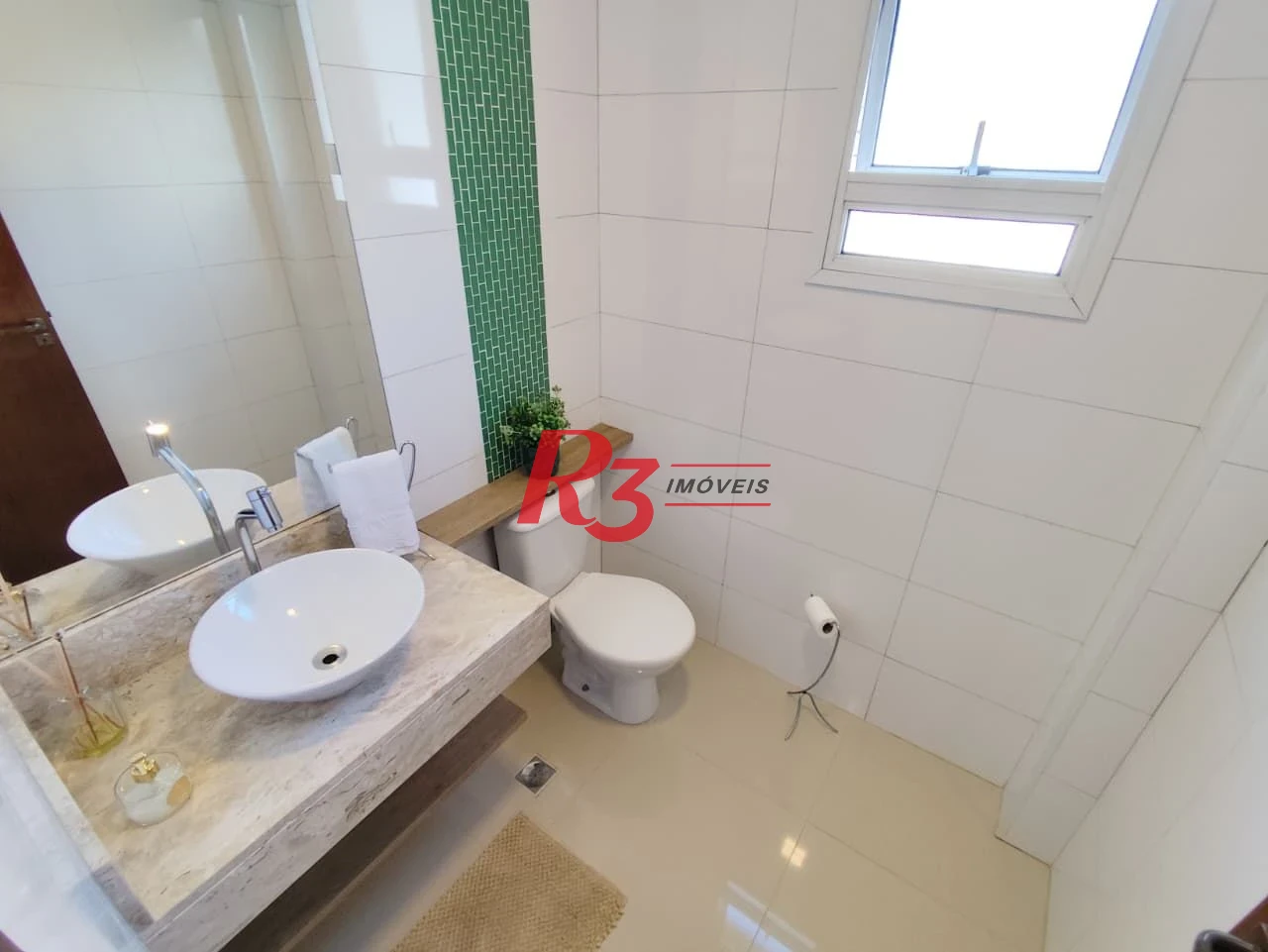 Casa com 3 dormitórios à venda, 165 m² por R$ 1.100.000,00 - Marapé - Santos/SP
