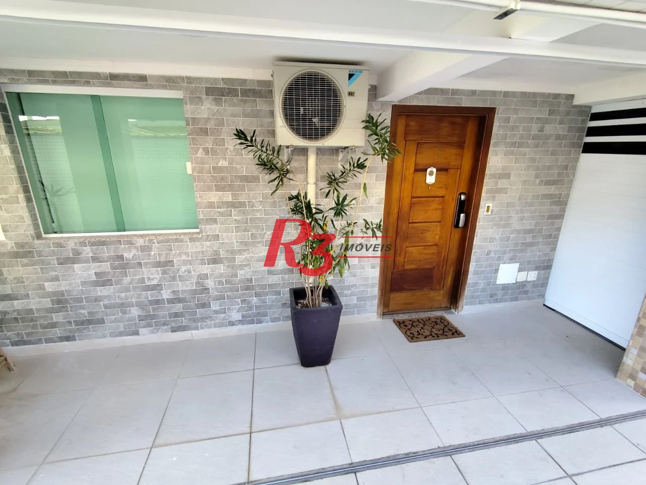 Casa com 3 dormitórios à venda, 165 m² por R$ 1.100.000,00 - Marapé - Santos/SP