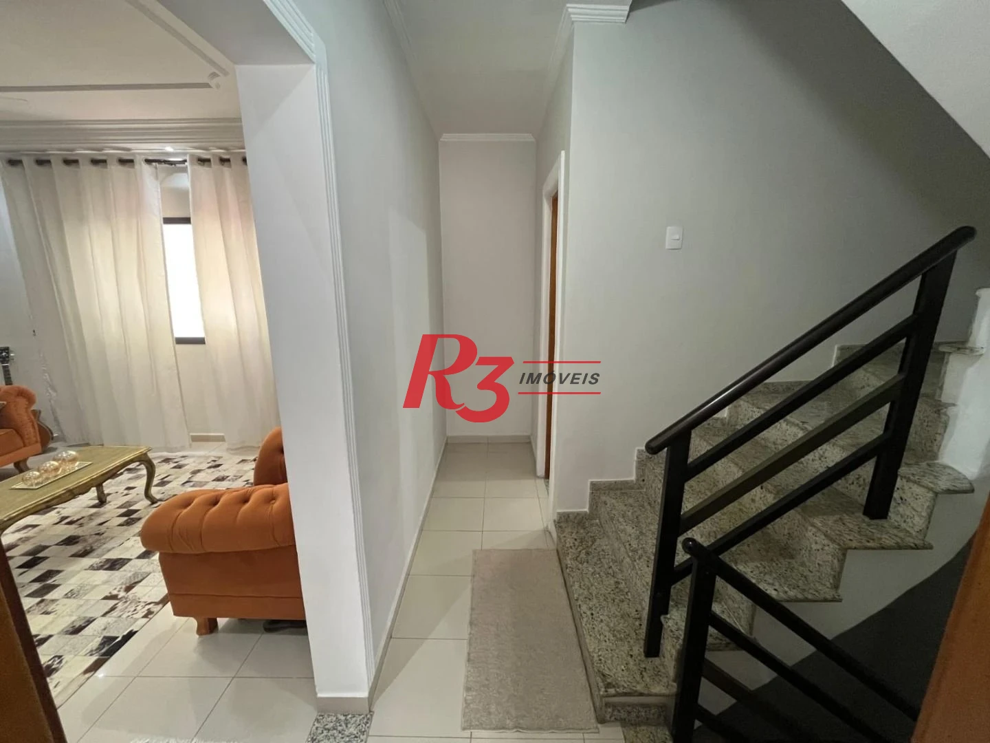 Casa com 3 dormitórios à venda, 141 m² por R$ 690.000,00 - Centro - São Vicente/SP