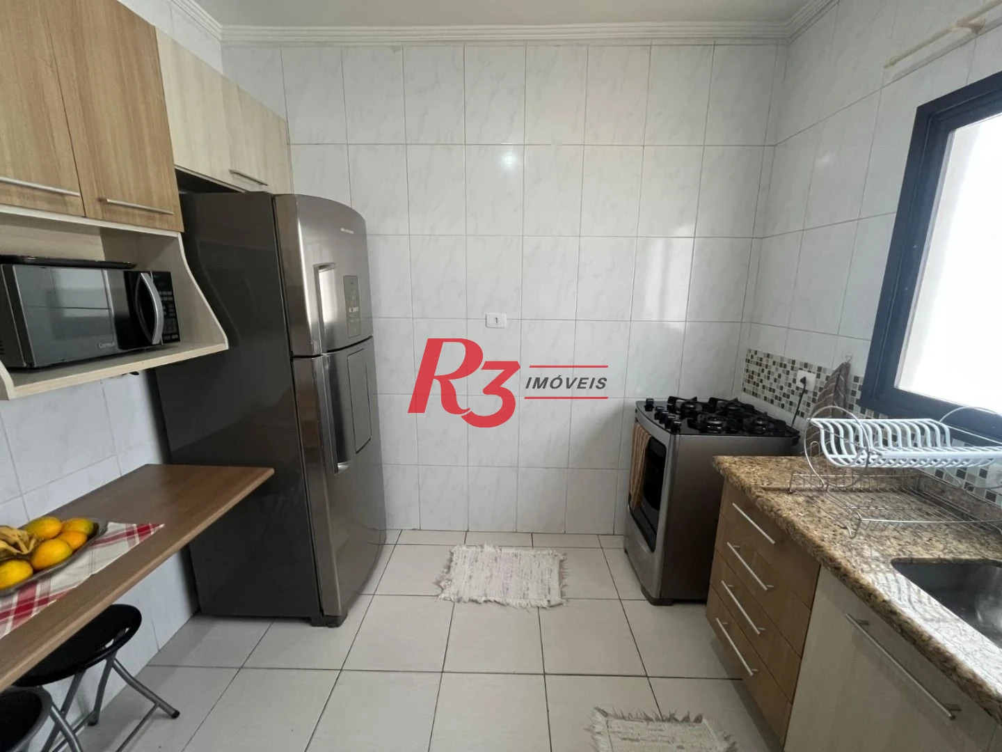Casa com 3 dormitórios à venda, 141 m² por R$ 690.000,00 - Centro - São Vicente/SP