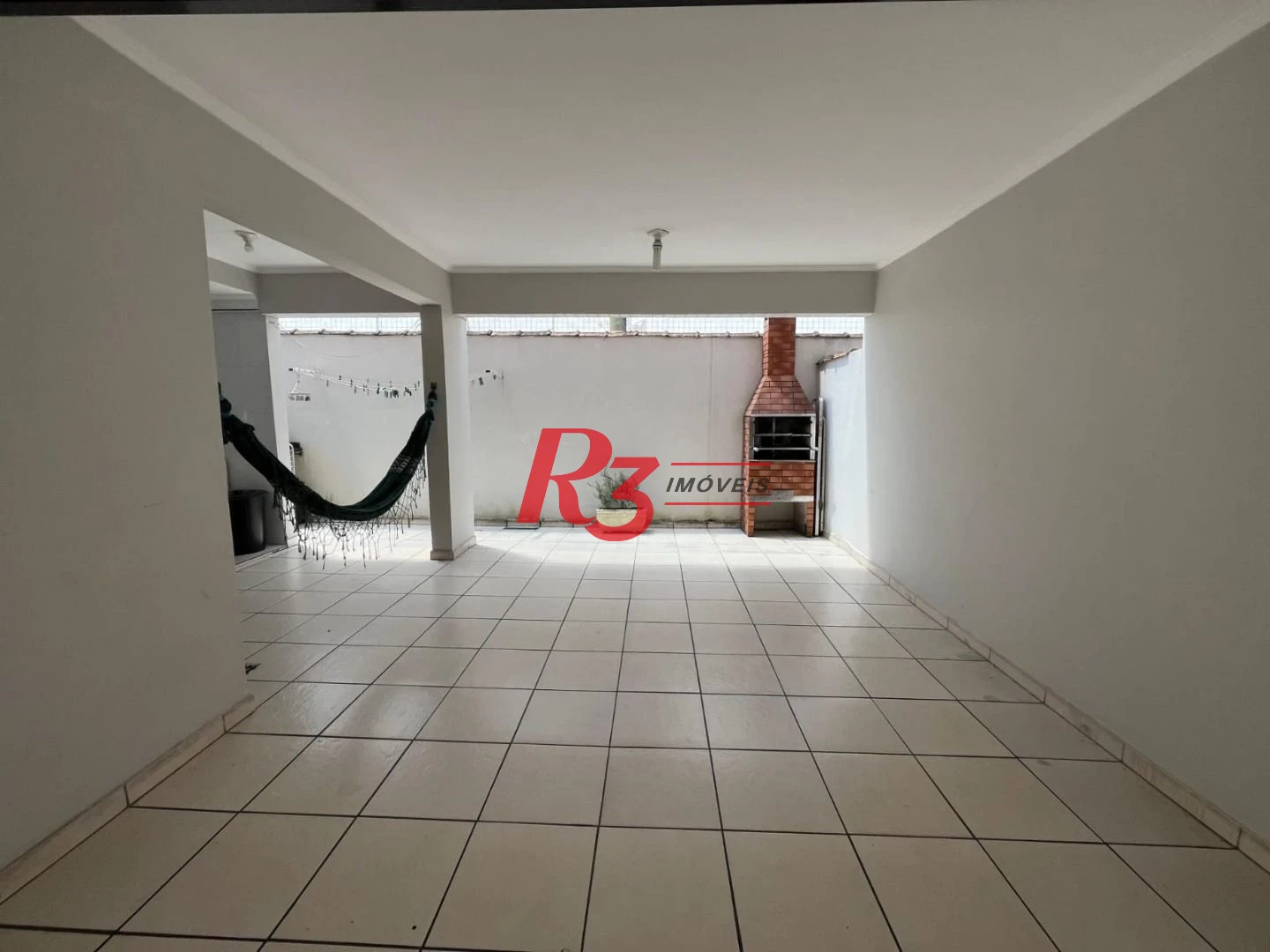 Casa com 3 dormitórios à venda, 141 m² por R$ 690.000,00 - Centro - São Vicente/SP